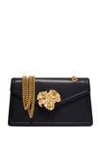 Black leather women's handbag with decorative element TORES-1394-99(Z26)