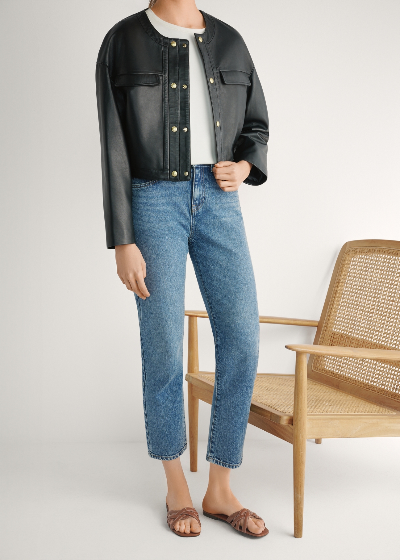 Women's camel leather slides with braid BUTYD-1222-1D(W26), front view of the product on the model's feet, on a light background.