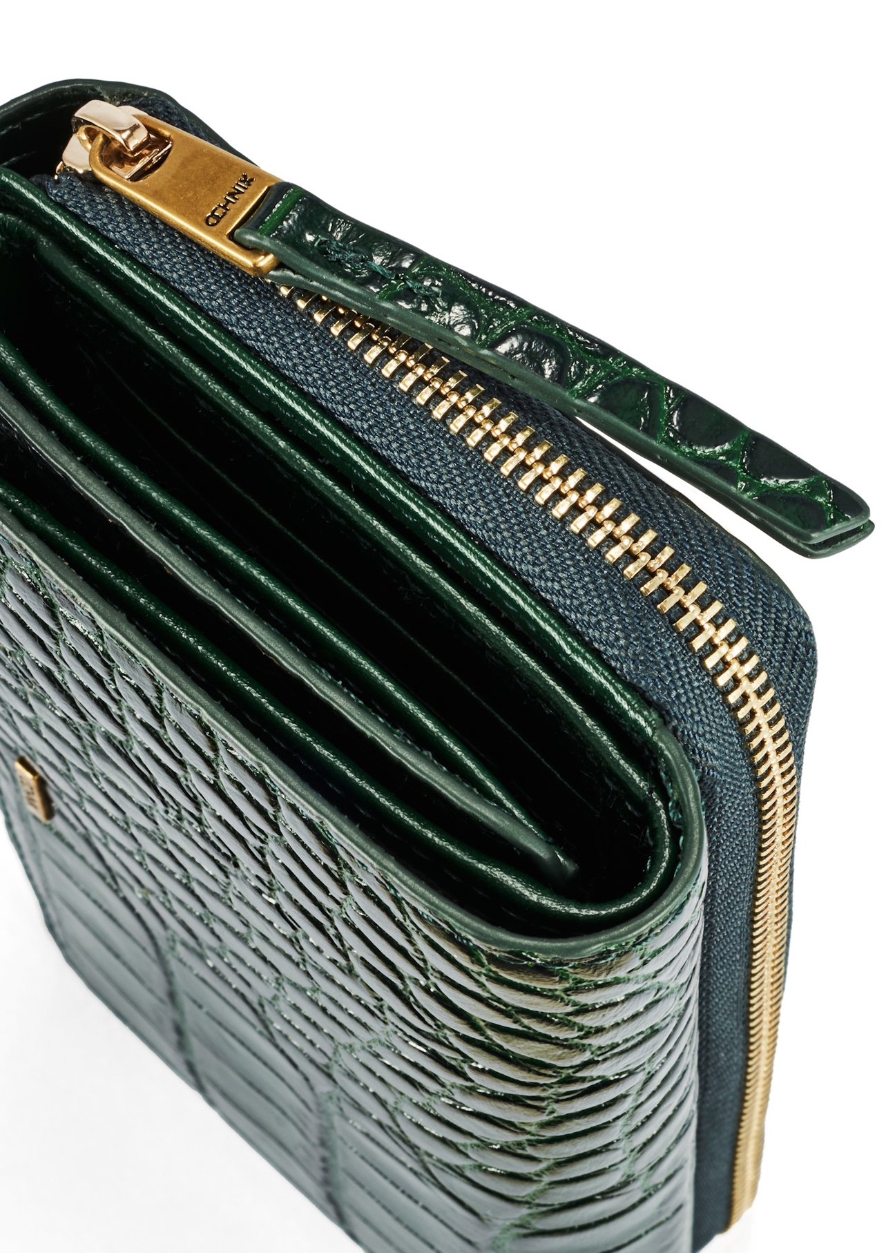 Dark green croco women's wallet PORES-0951-51(W25) - close-up of detail on white background.