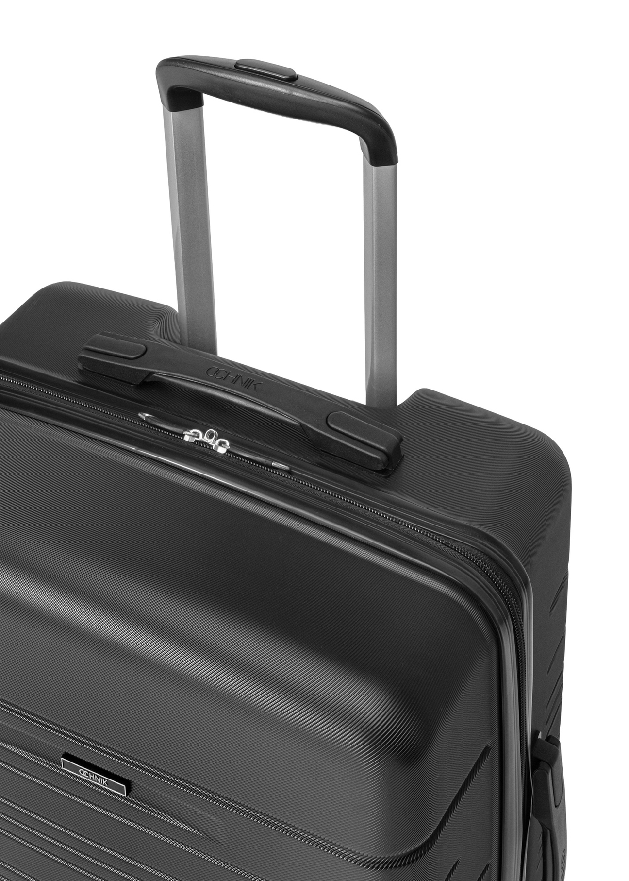 Medium suitcase on wheels WALAB-0083-99-24(W26) - close-up of detail, on white background.