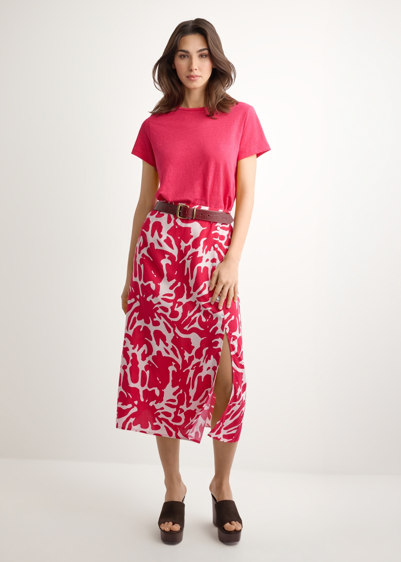Pink viscose midi skirt SPCDT-0129-5P(W26), front product view on model. Full body visible.