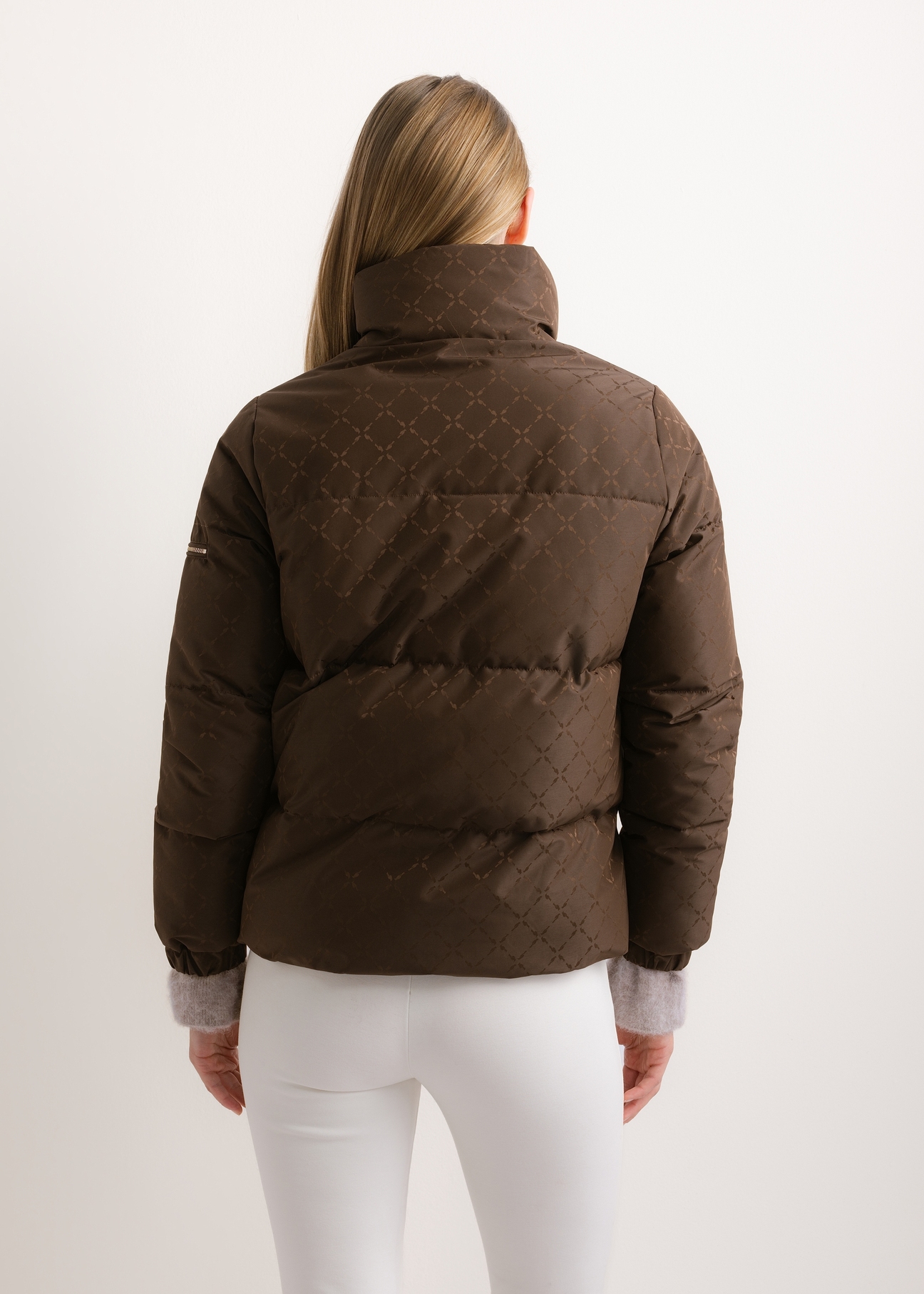 Women's dark brown monogram jacket with stand-up collar KURDT-0694-1I(Z26), product view from the back on a model. Half of the silhouette visible.