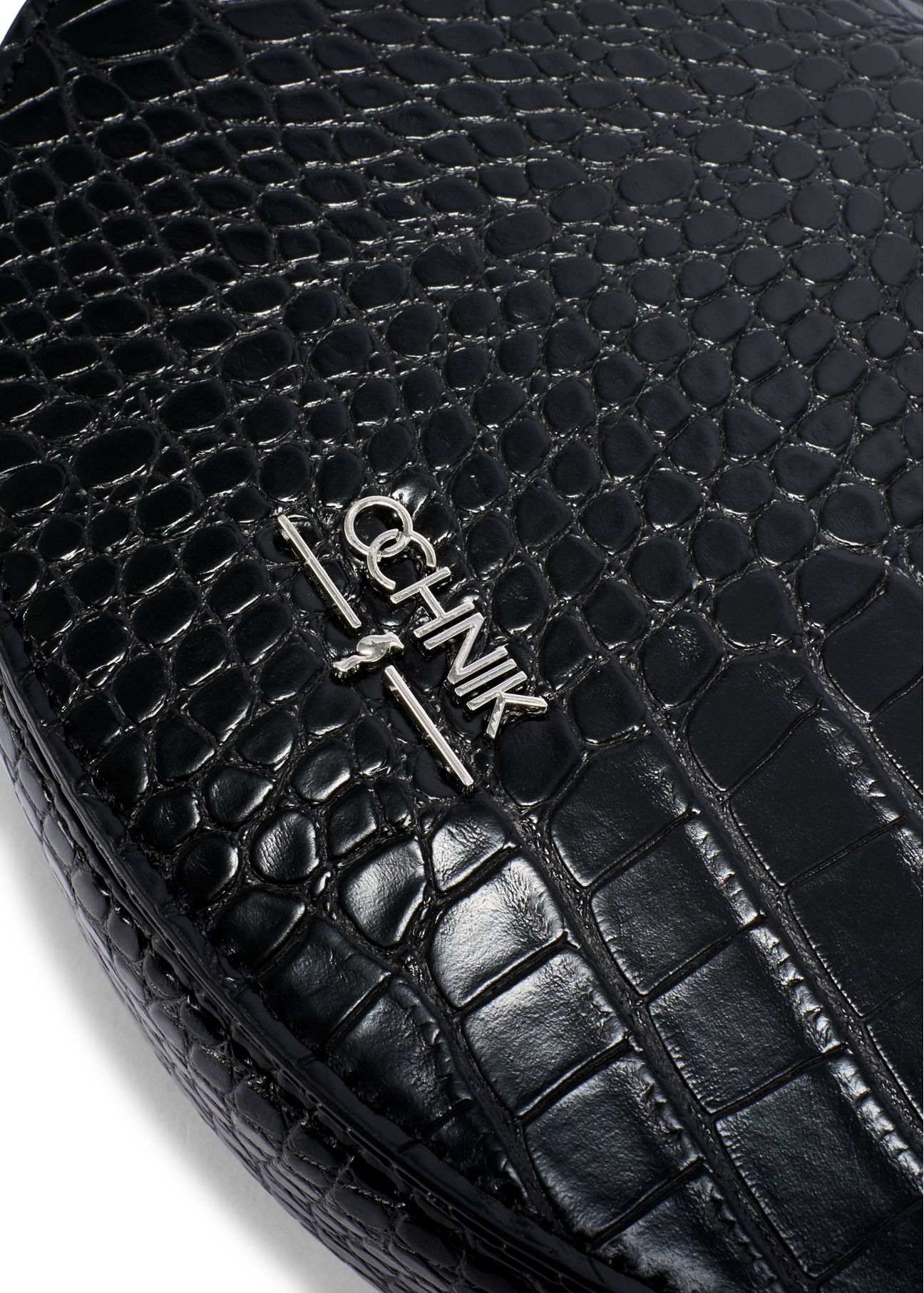 Black semi-circular women's croco messenger bag TOREC-1184-9G(W26), close-up of the product detail on a white background.