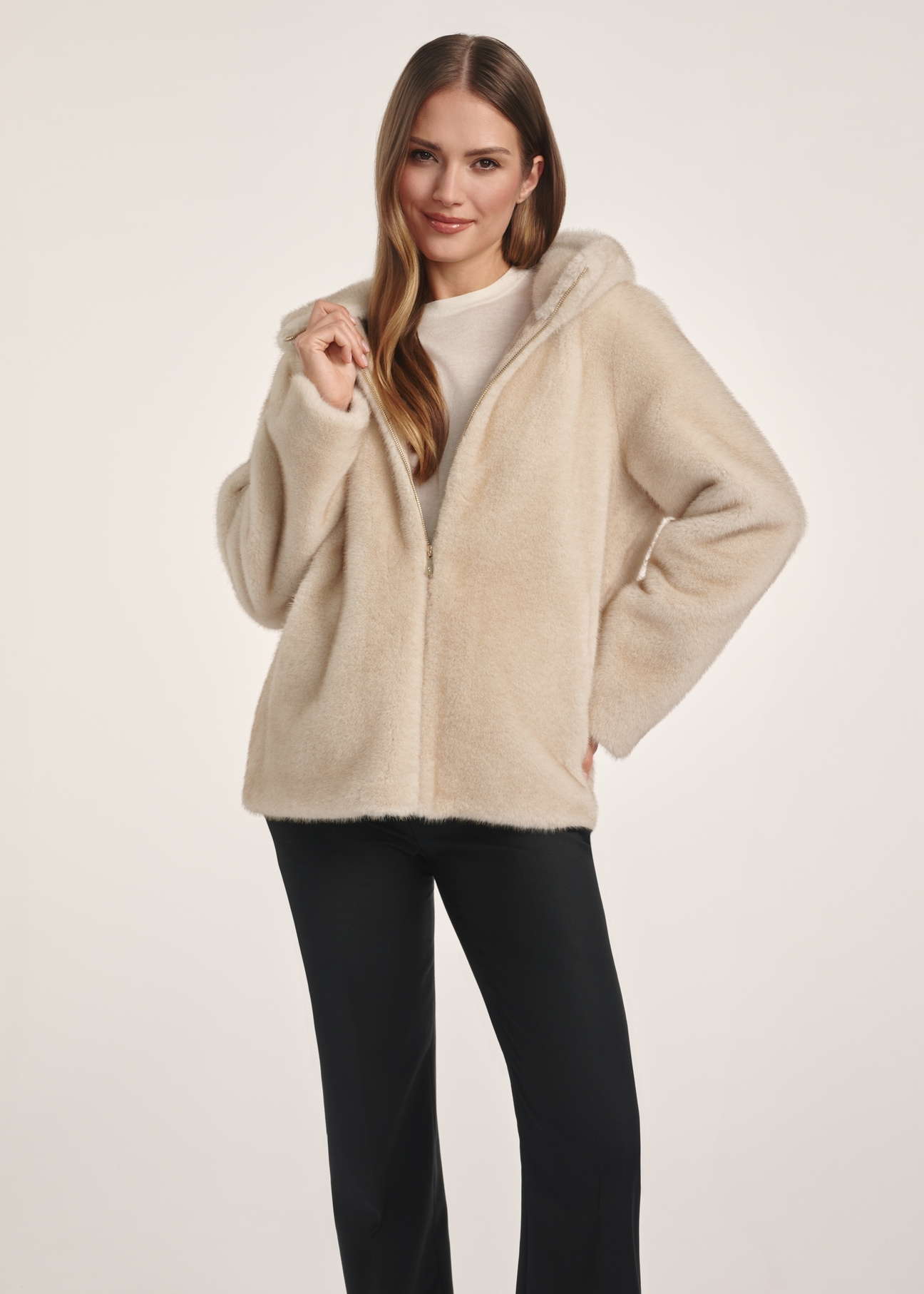 Beige women's fur coat with zipper FUTDP-0057-80(Z25), product view from the front on the model, half of the silhouette visible.