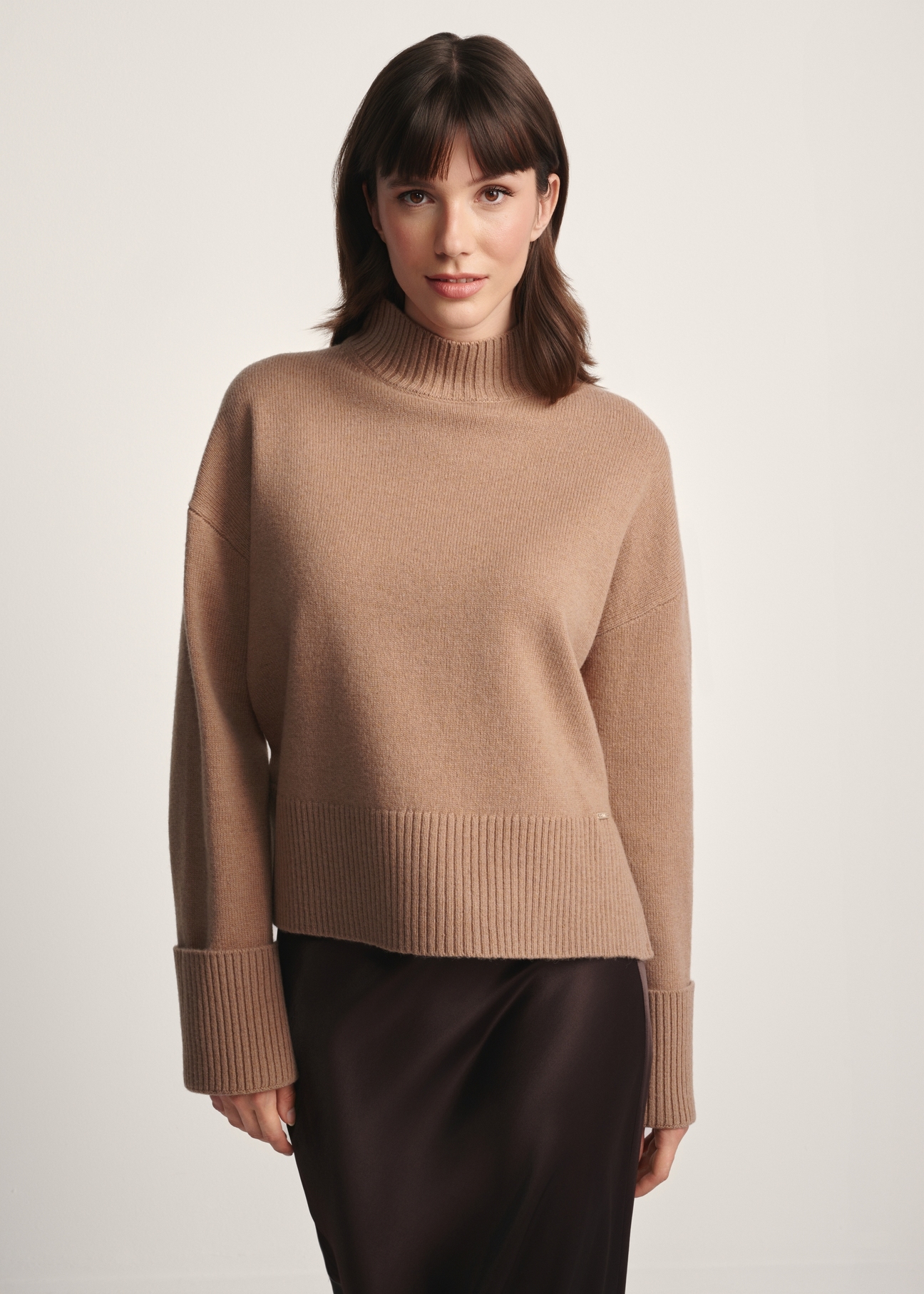 Women's camel wool sweater SWEDT-0244-24(Z25), front view of the product on the model. Half of the silhouette visible.
