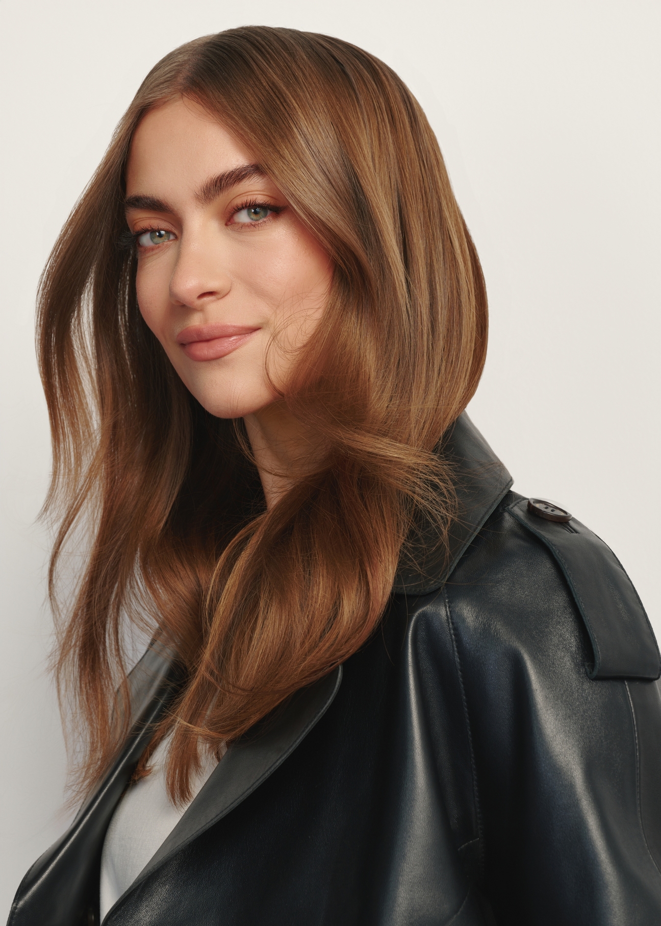 Black short oversize women's leather jacket KURDS-0540-99(W26), close-up of the product detail on the model.