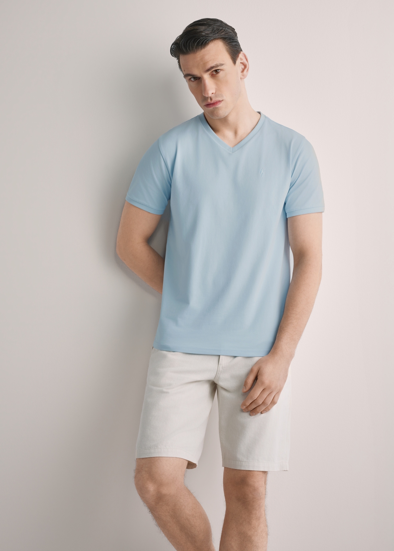 Men's blue cotton T-shirt TSHMT-0088-7A(W26), front view of the product on the model. Half of the silhouette visible.