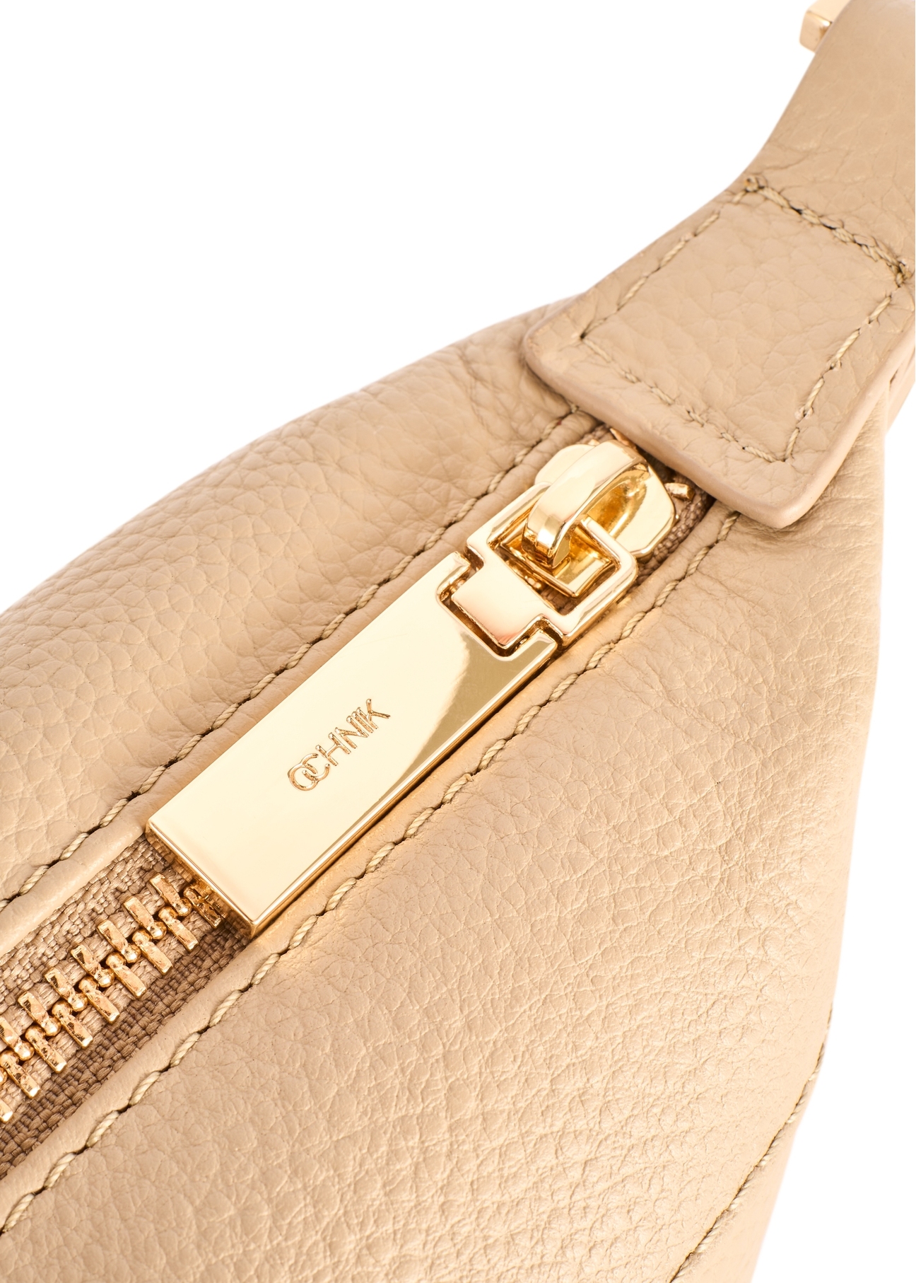 Beige small handbag made of natural leather TORES-1267-1B(W26), close-up of the product detail, view on a white background.