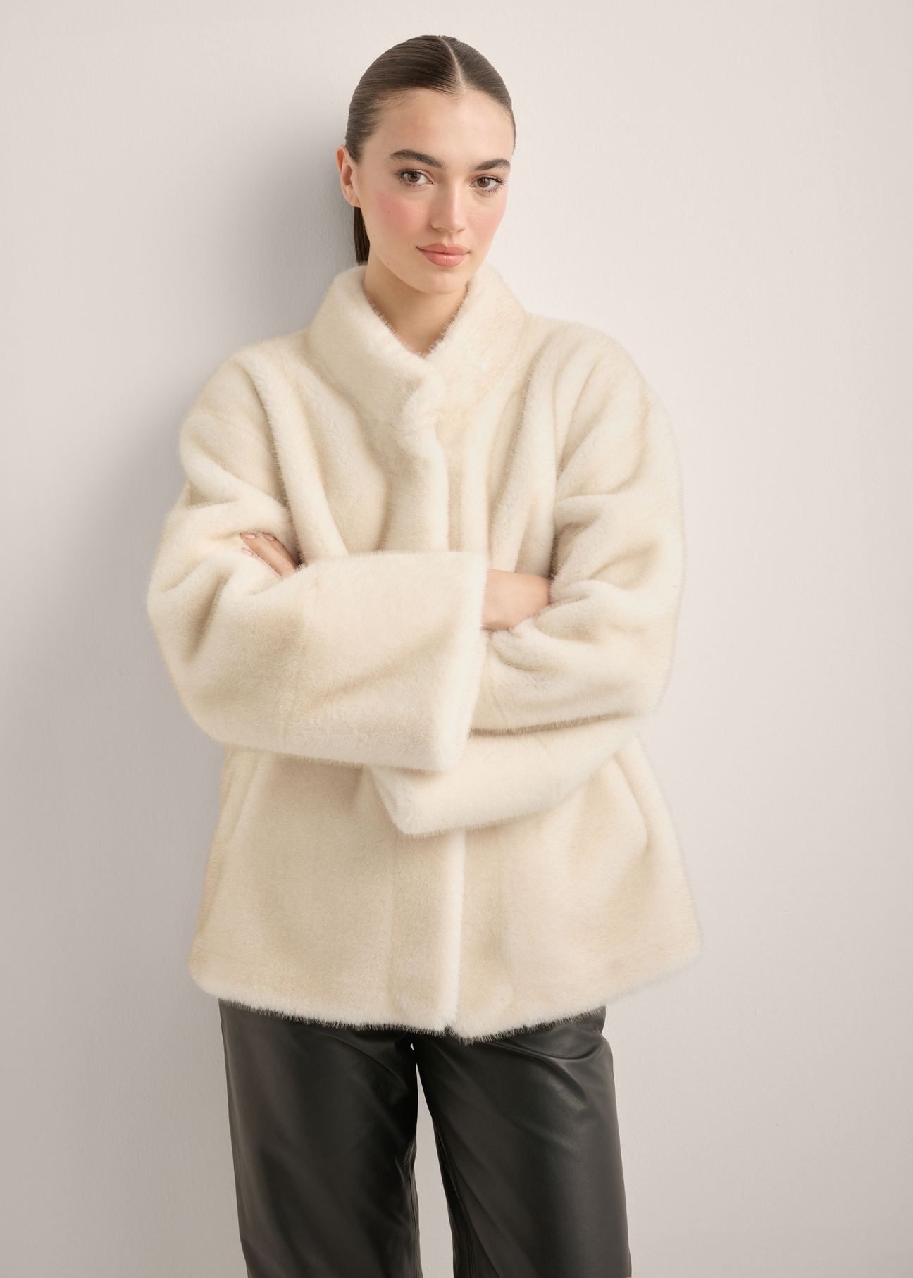 Cream short women's fur coat FUTDP-0084-0B(Z26) - front view of the product, on a model, against a white background. Half of the silhouette visible.