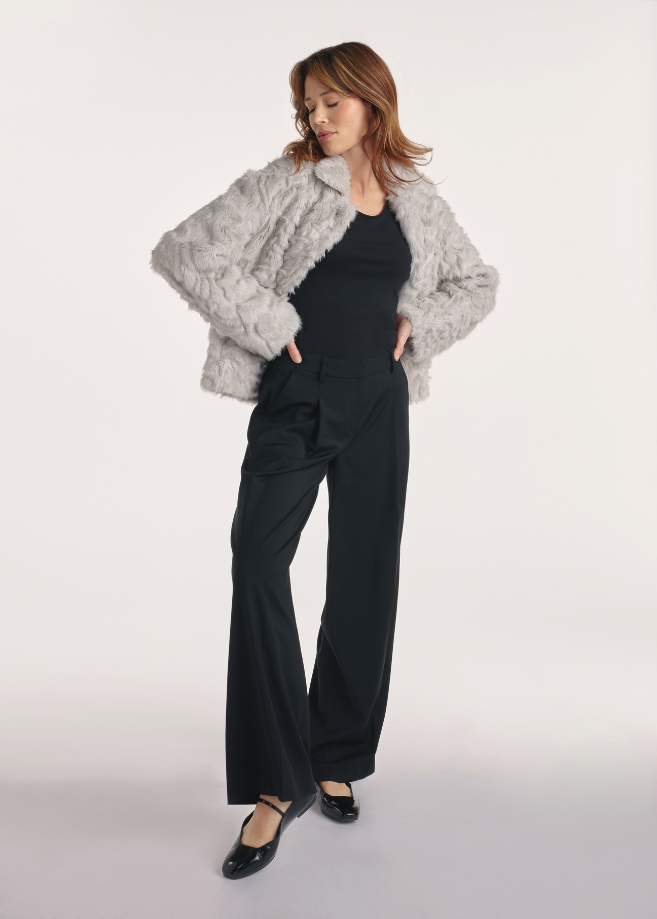 Gray women's fur coat FUTDP-0058-91(Z25), product photo from the front on the model, the whole silhouette is visible.