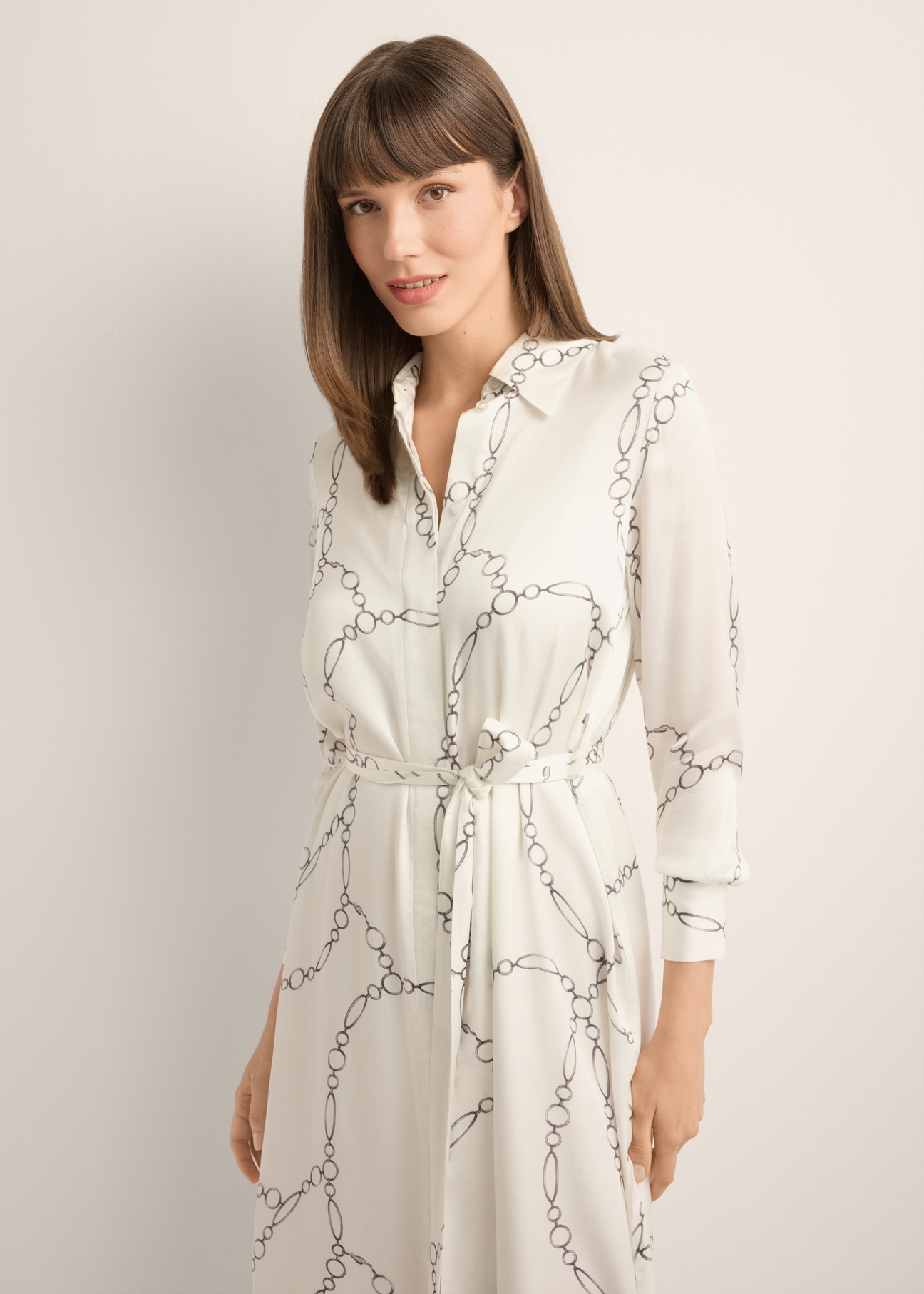 White long viscose dress SUKDT-0285-0P(Z26), product view from the front on the model, half of the silhouette visible.