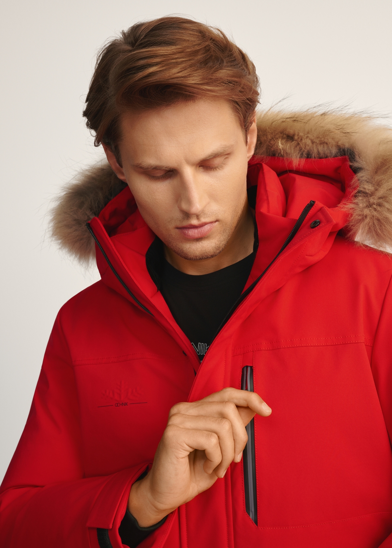 Red men's winter jacket KURMT-0396-42(Z25) - close-up on the model, on a white background.