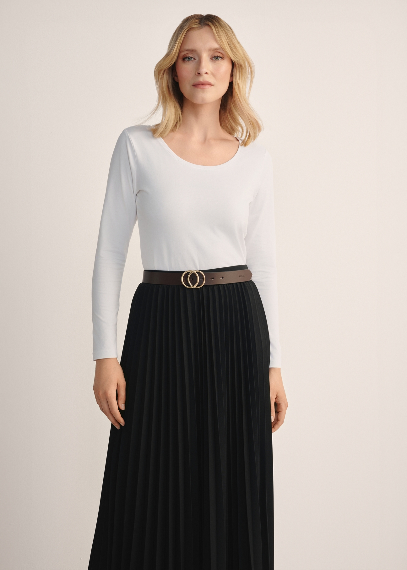 White women's blouse with long sleeves LSLDT-0038-11(KS), product view from the front on the model, half of the silhouette visible.