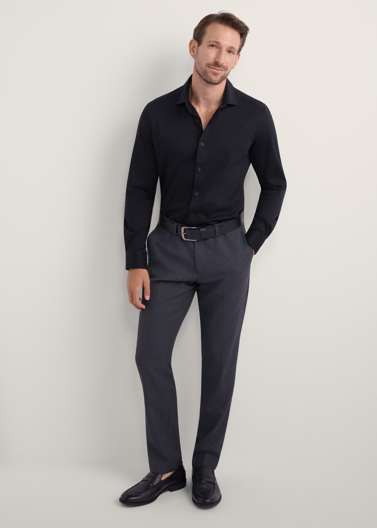 Black elegant men's shirt KOSMT-0339-99(Z25), front view of the product on the model. Full body visible.