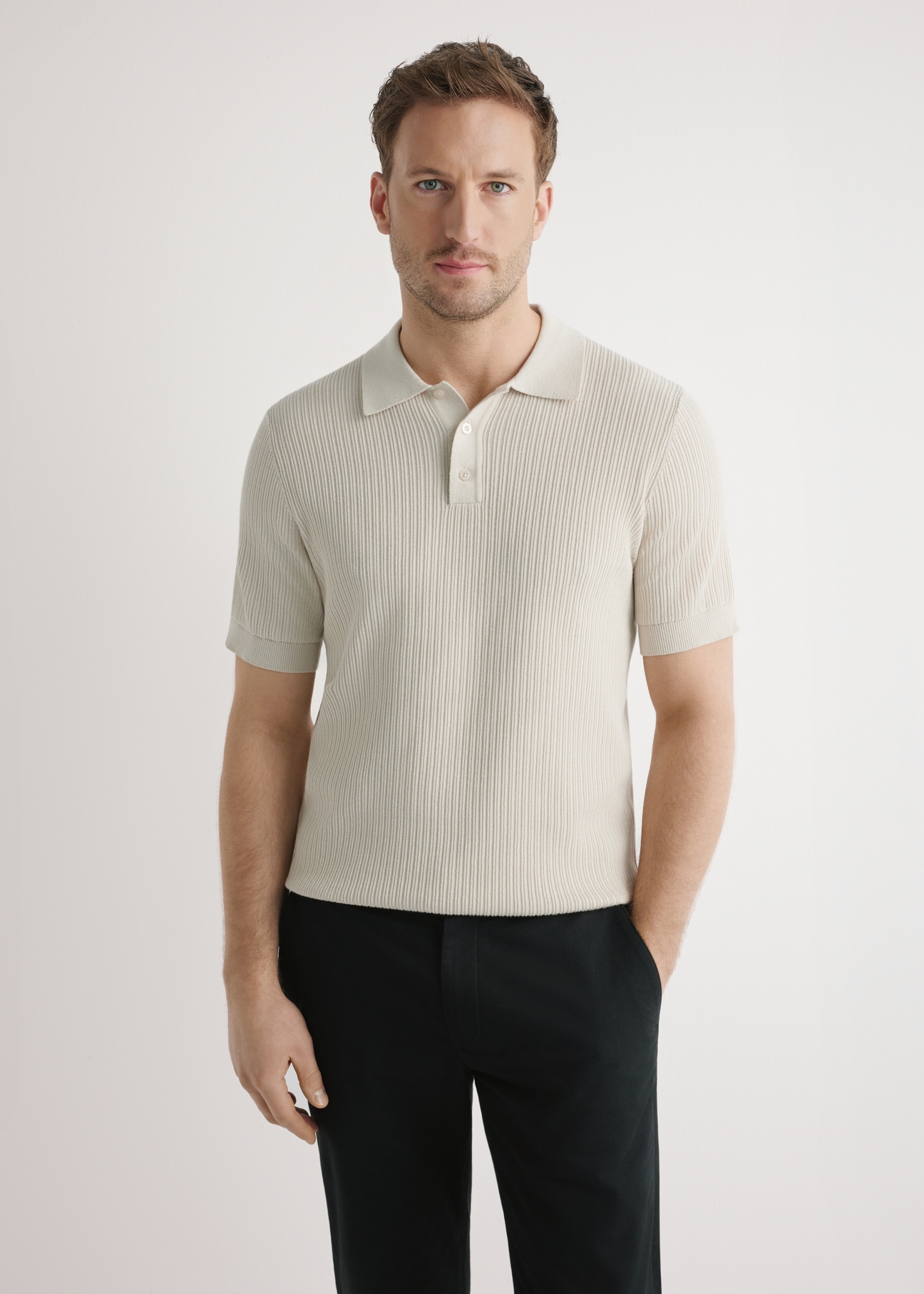Light beige ribbed polo shirt POLMT-0085-1A(W26), front view of the product on the model. Half of the silhouette visible.