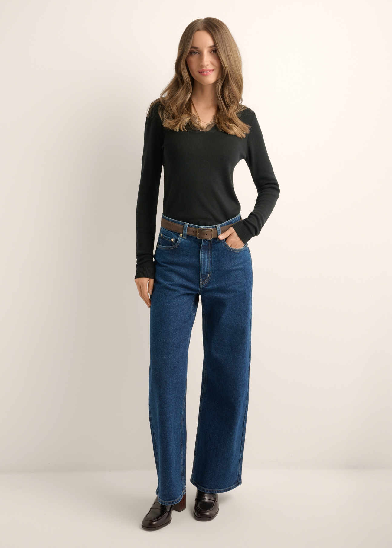Thin black women's sweater with lace accent SWEDT-0262-99(Z26), front view of the product on the model. Full body visible.