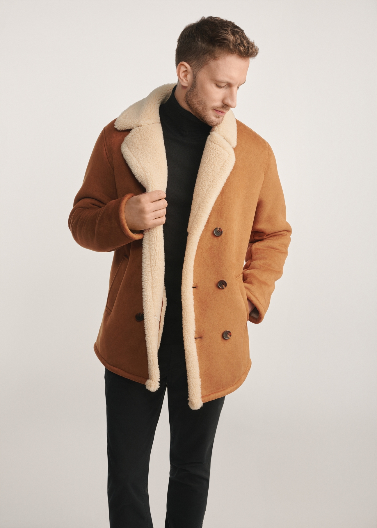 Men's sheepskin coat in camel color KOZMP-0010-24(Z25) - front view of the product on a model on a white background. Visible silhouette.