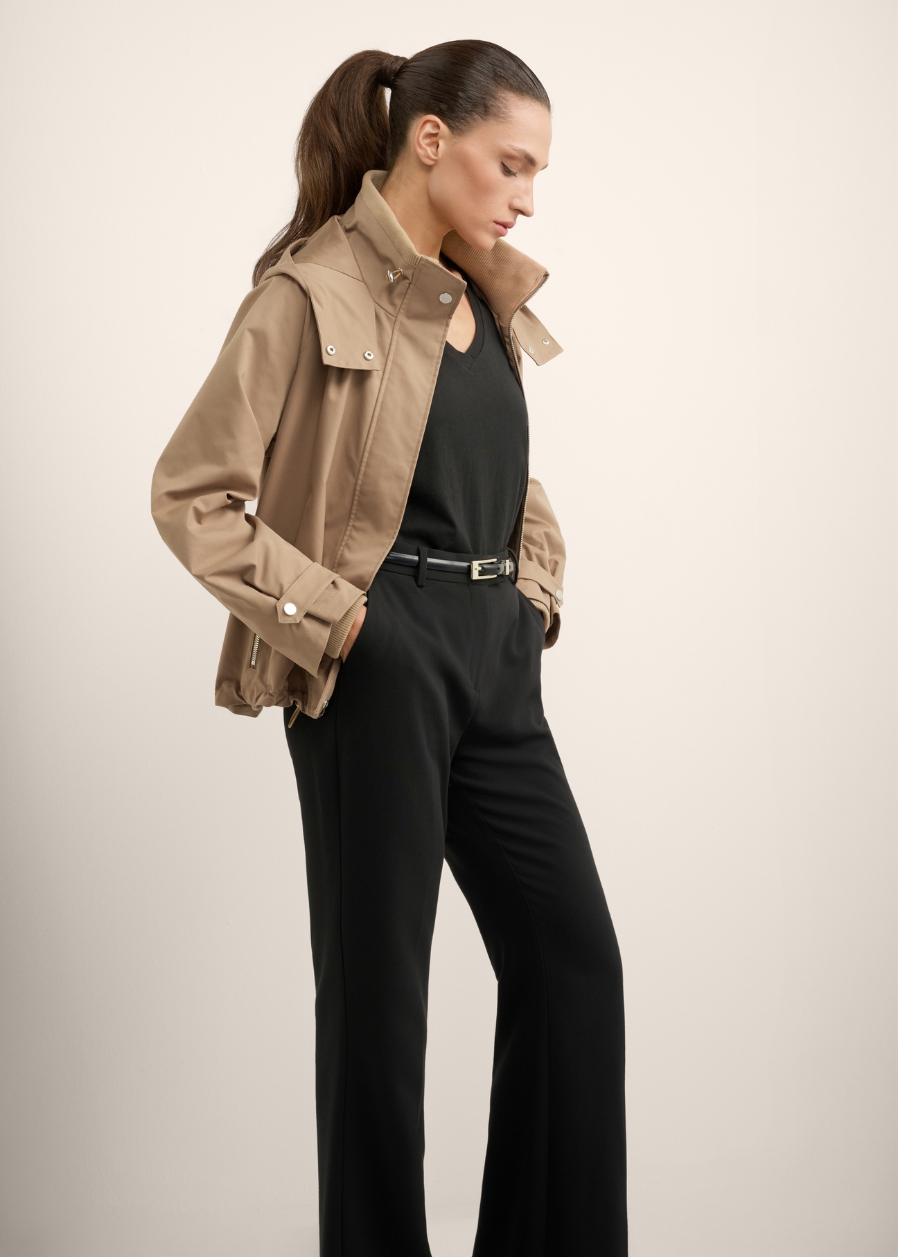 Beige women's transitional jacket KURDT-0644-1D(Z26), side view of the product on the model. Full body visible.