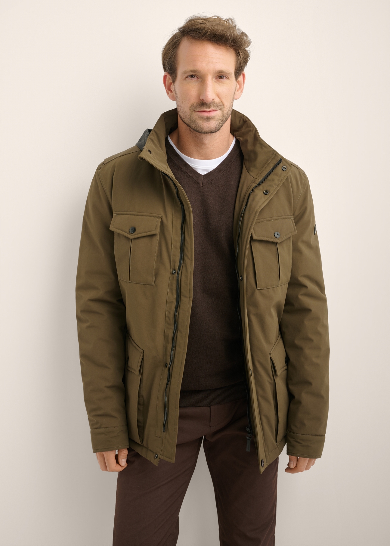 Men's transitional khaki jacket KURMT-0437-8D(Z26), front product view on model. Half silhouette visible.