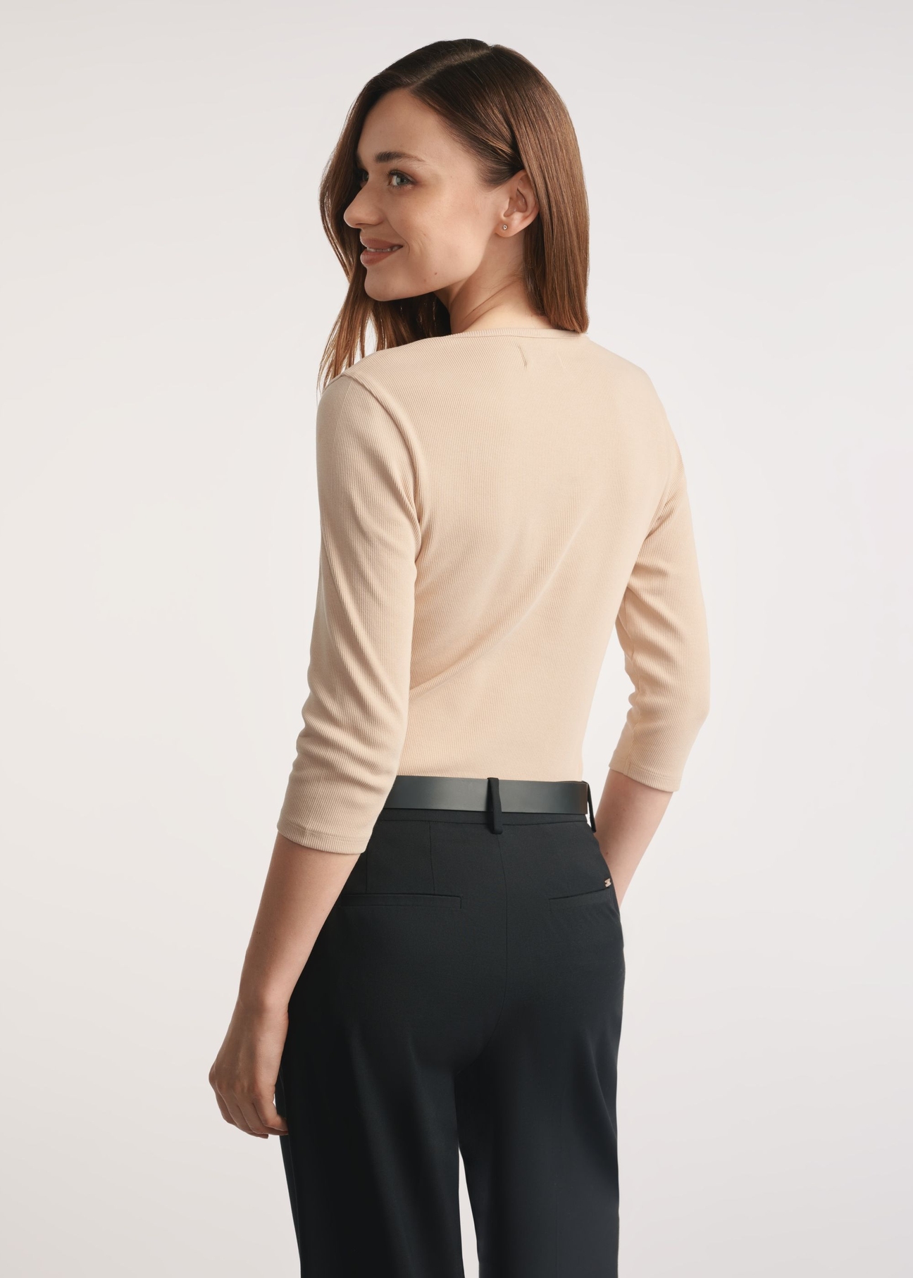 Beige women's V-neck blouse LSLDT-0036-1A(W26) - side view of the product, against a light background. Half of the silhouette visible.