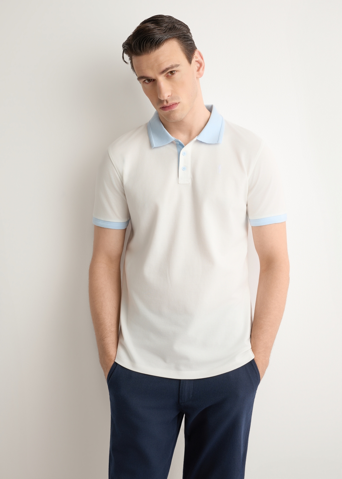 Men's cream polo shirt POLMT-0093-0B(W26), front view of the product on the model. Half of the silhouette visible.