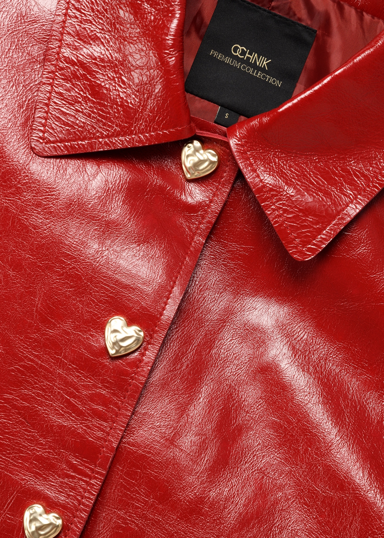 Red short women's jacket KURDS-0612-4B(W26), close-up of product detail on white background.