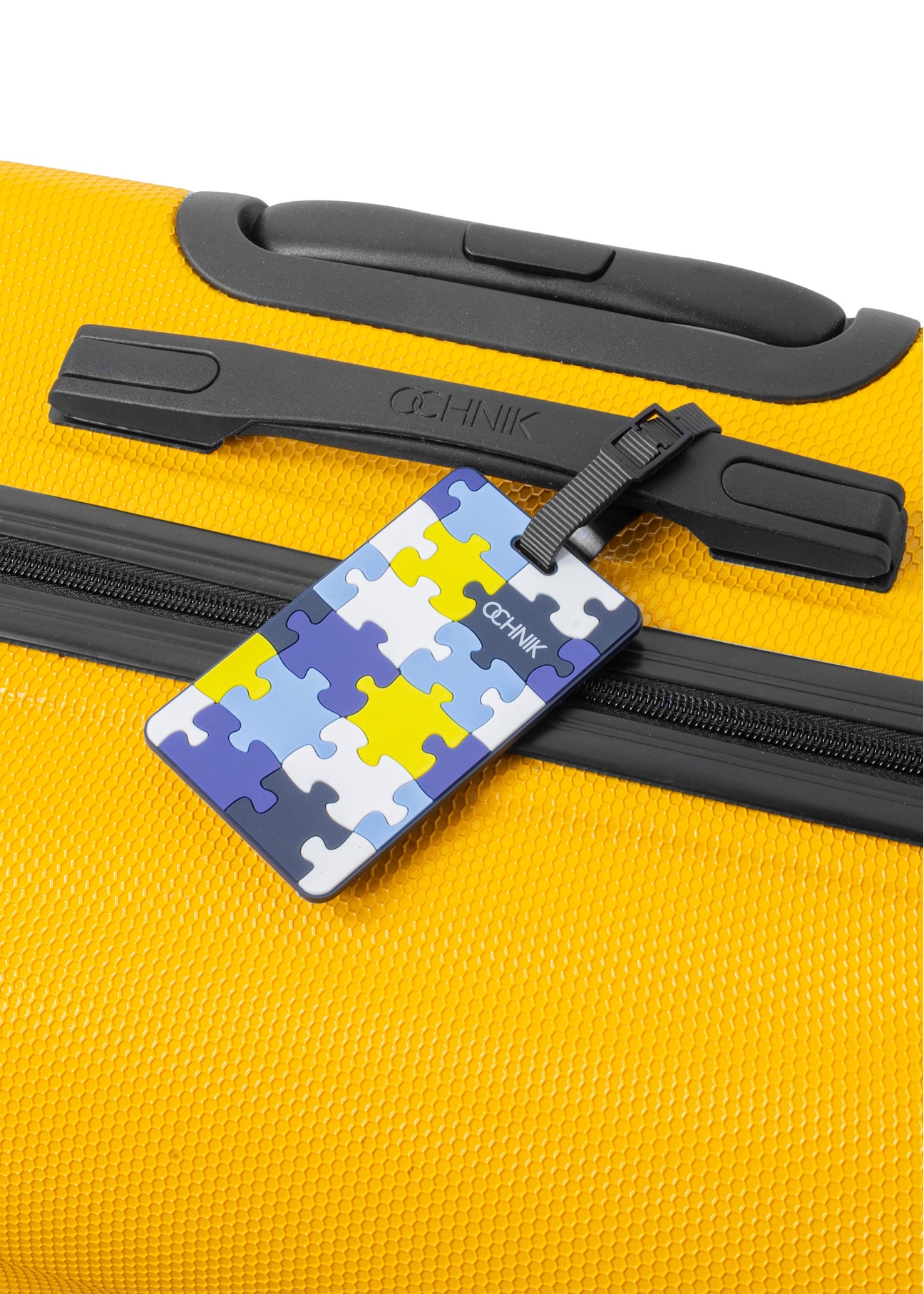 Luggage tag AW-012-0001-61(W25), product view on a suitcase on a white background.
