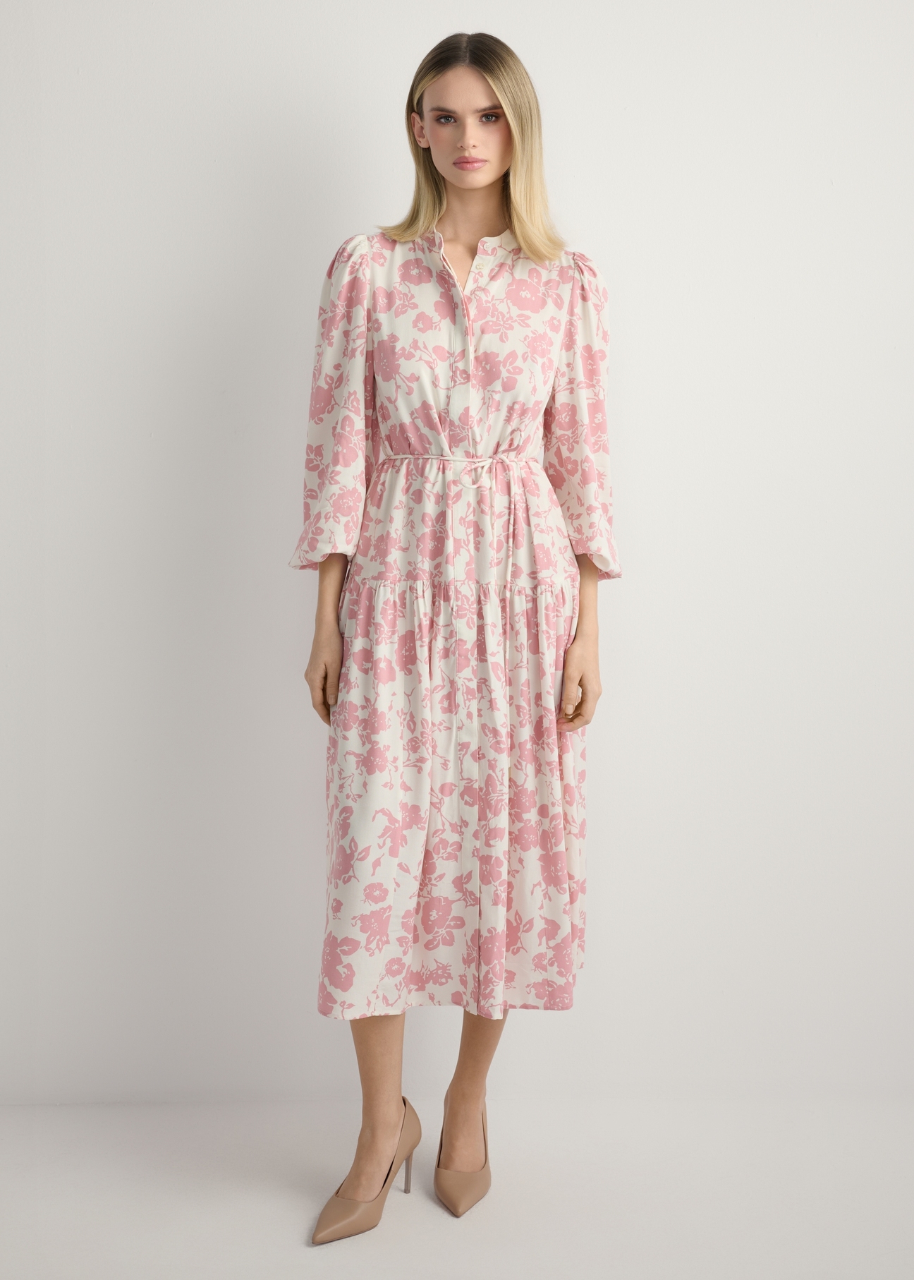 Pink floral midi dress SUKDT-0270-5P(W26), front view of the product on the model. Full silhouette visible.
