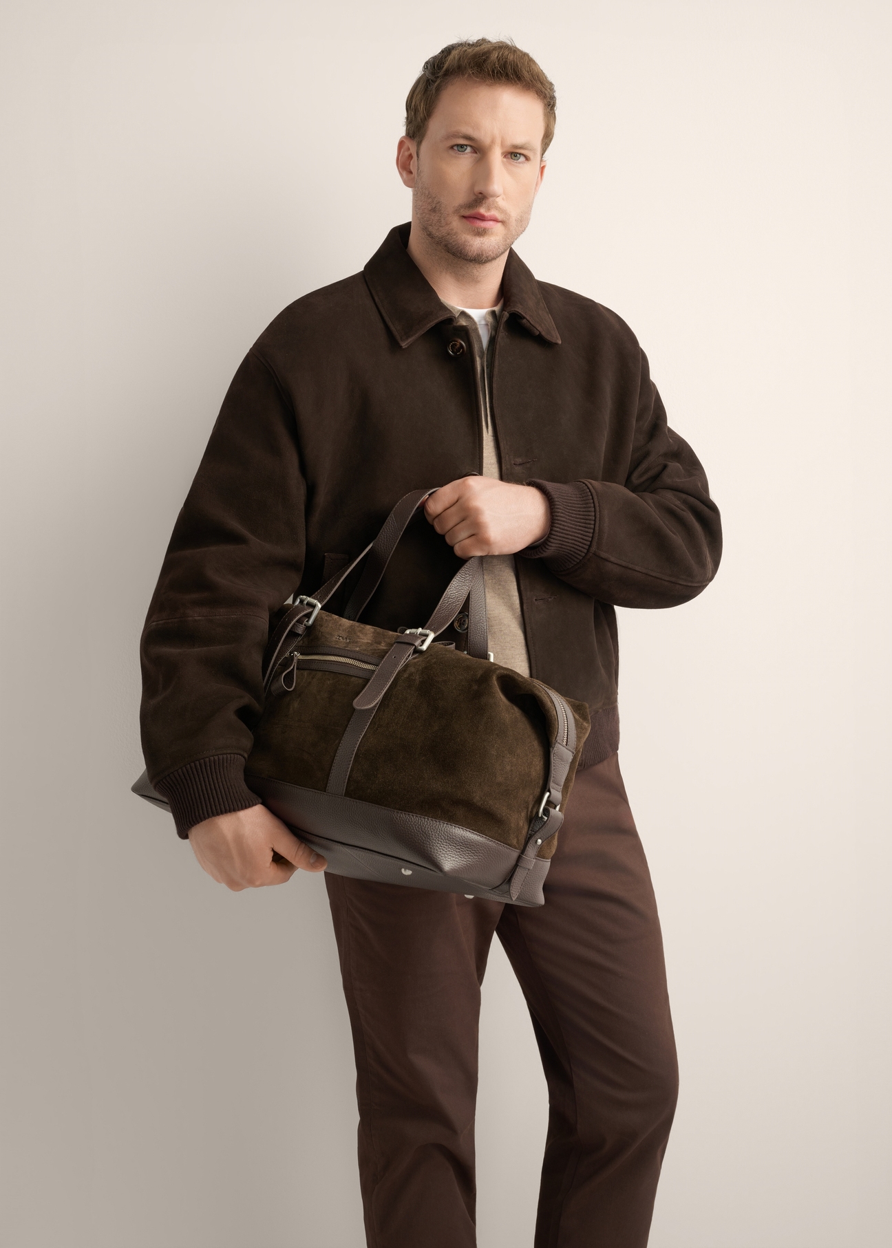 Brown suede men's bag TORMS-0540-1I(Z26), front product view on the model's silhouette.