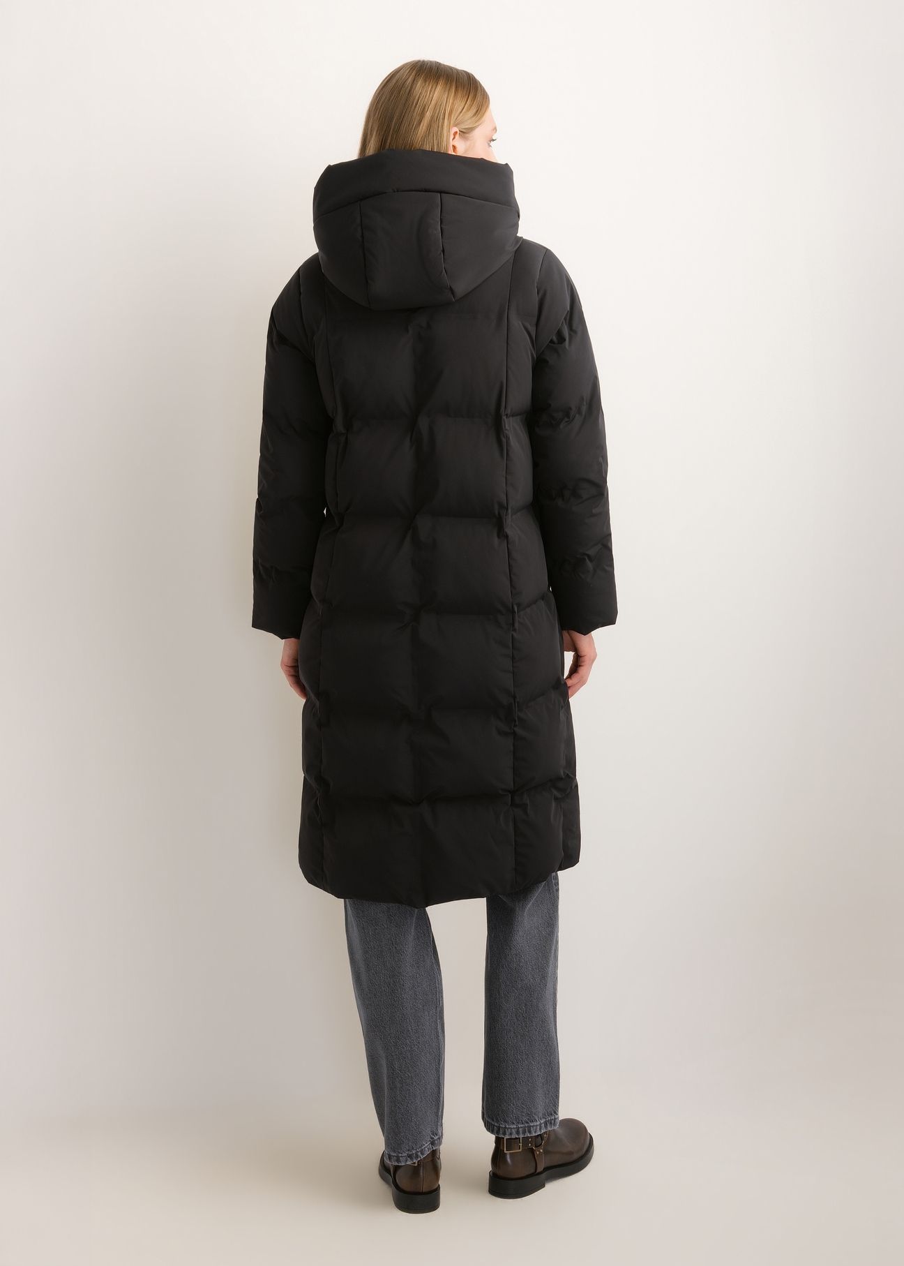 Black women's winter jacket KURDT-0699-99(Z26), product view from the back on the model. Full body visible.