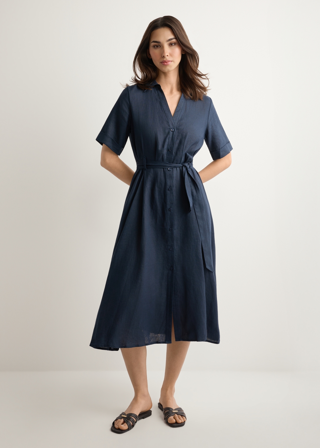 Dark navy linen midi shirt dress SUKDT-0281-7E(W26), front view of the product on the model against a light background. Full silhouette visible.