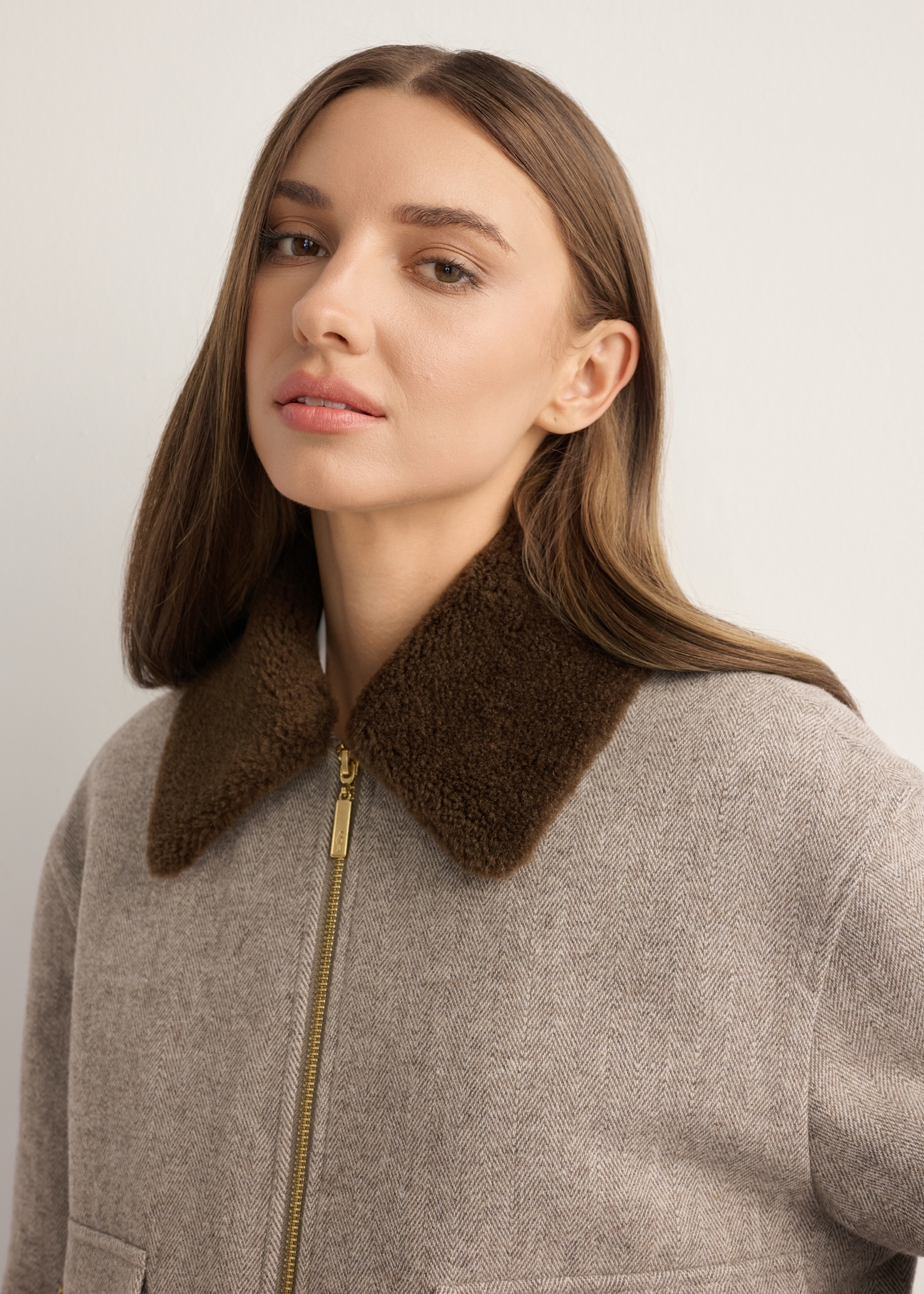 Short beige women's jacket with wool PLADT-0077-1B(Z26), close-up of the product on the model's silhouette.