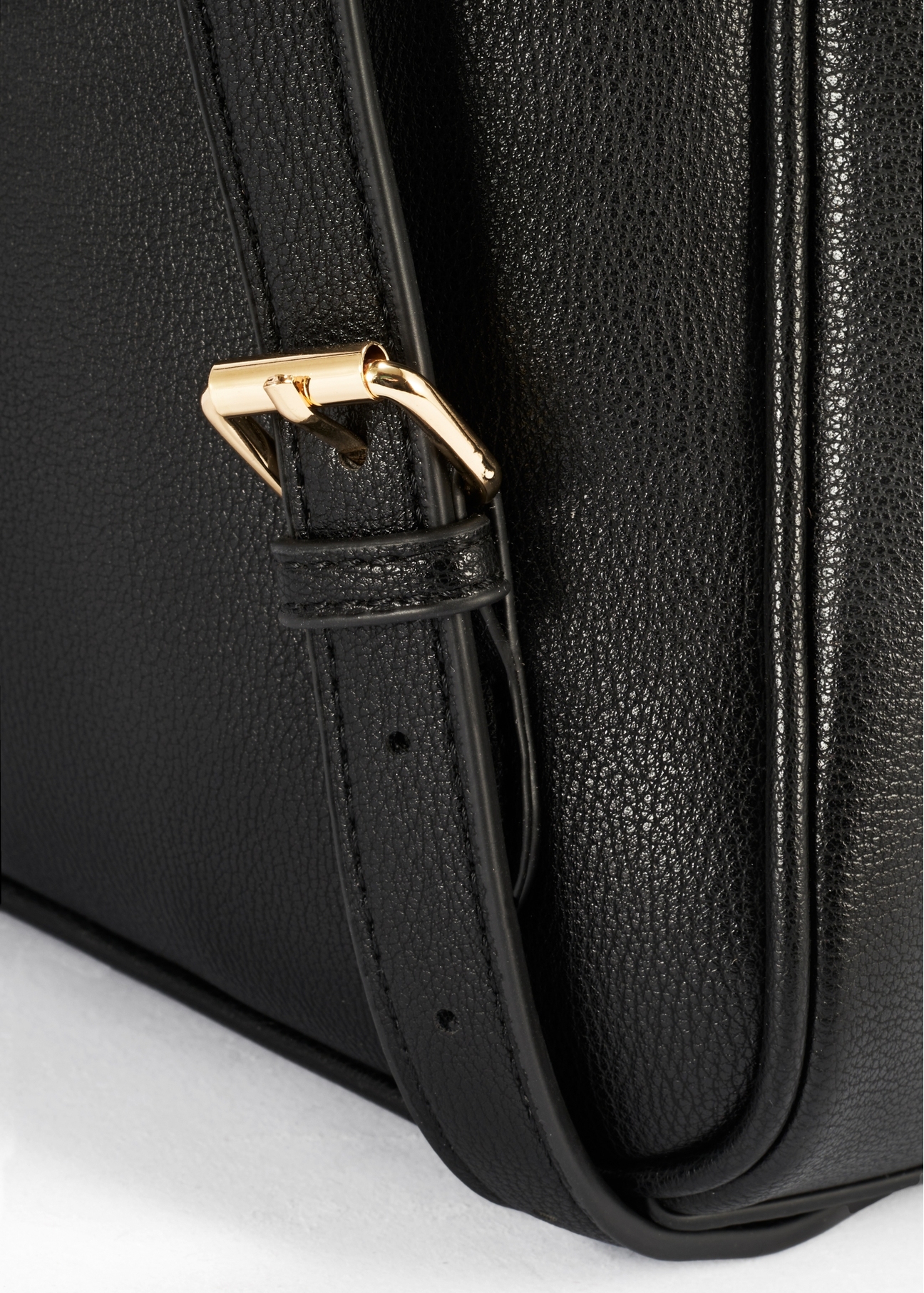 Black women's croco-style backpack TOREC-0725A-97(Z25), close-up of product detail, view on white background.