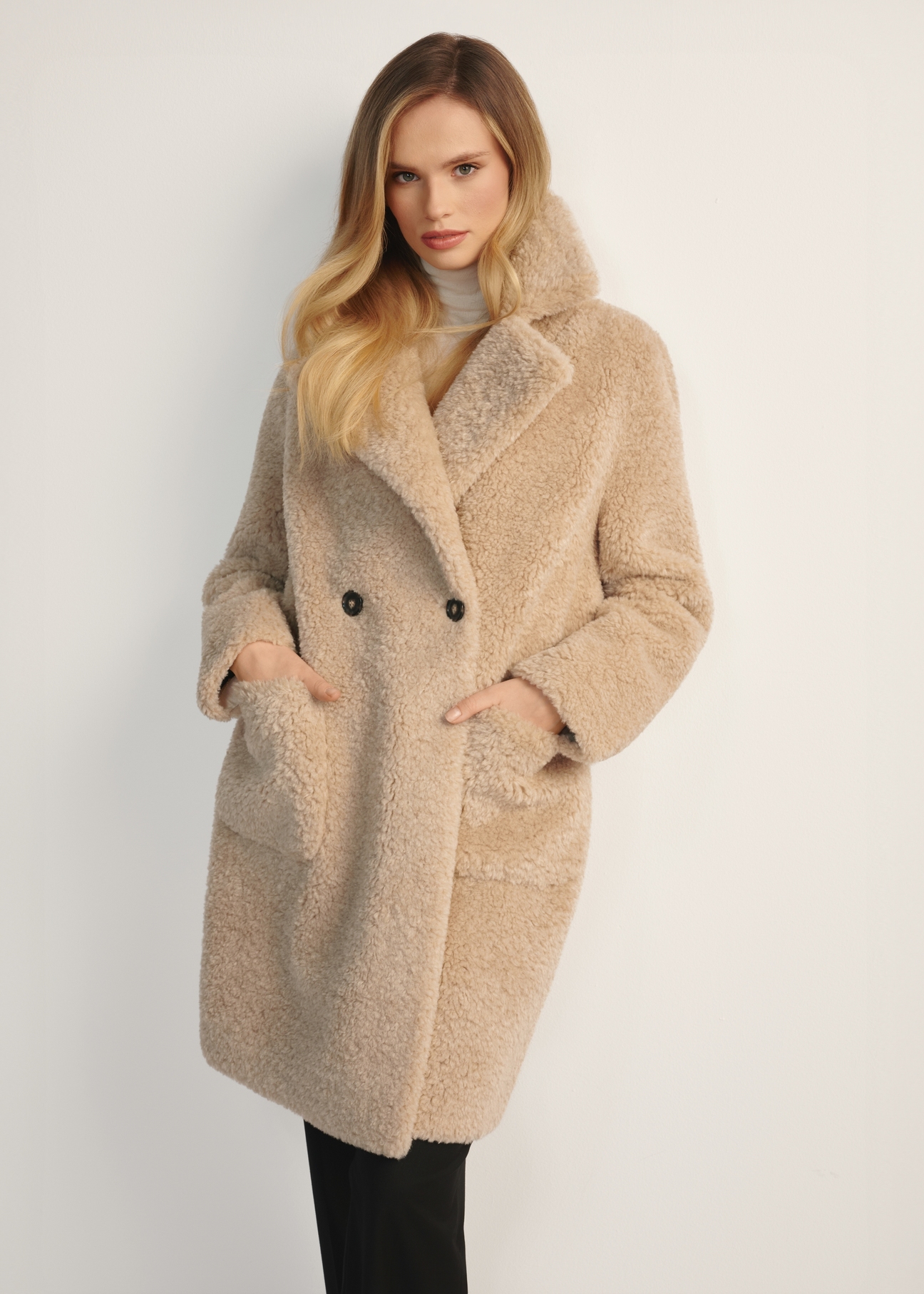 Women's fur coat with double-breasted fastening FUTDP-0018-81(Z25), product view from the front on the model, half of the silhouette visible.