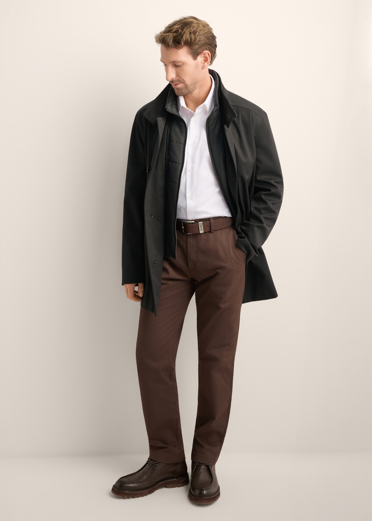 Men's long black jacket KURMT-0426-99(Z26), front product view on model. Full body visible.