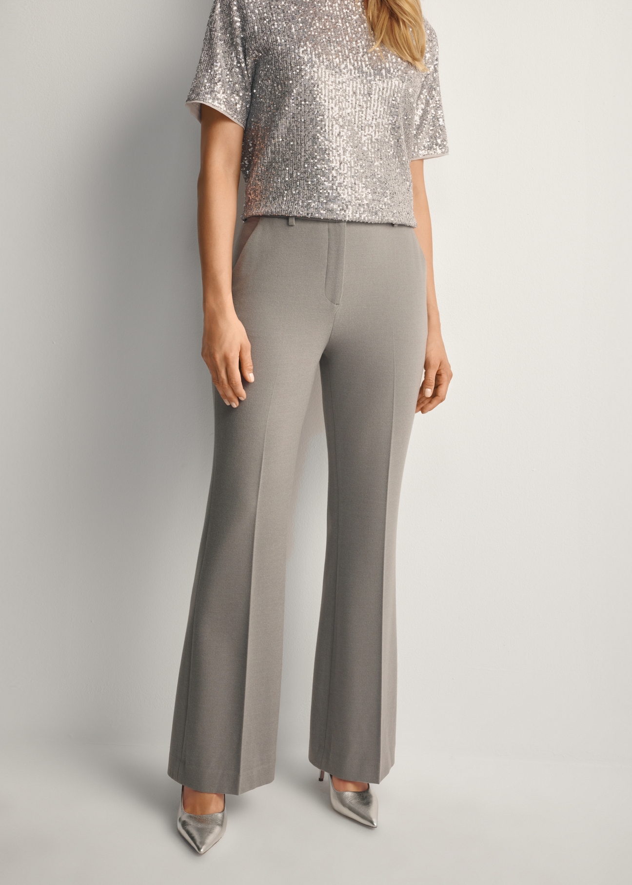 Women's gray trousers SPODT-0113-91(Z25), front view of the product on the model. Half of the silhouette visible.