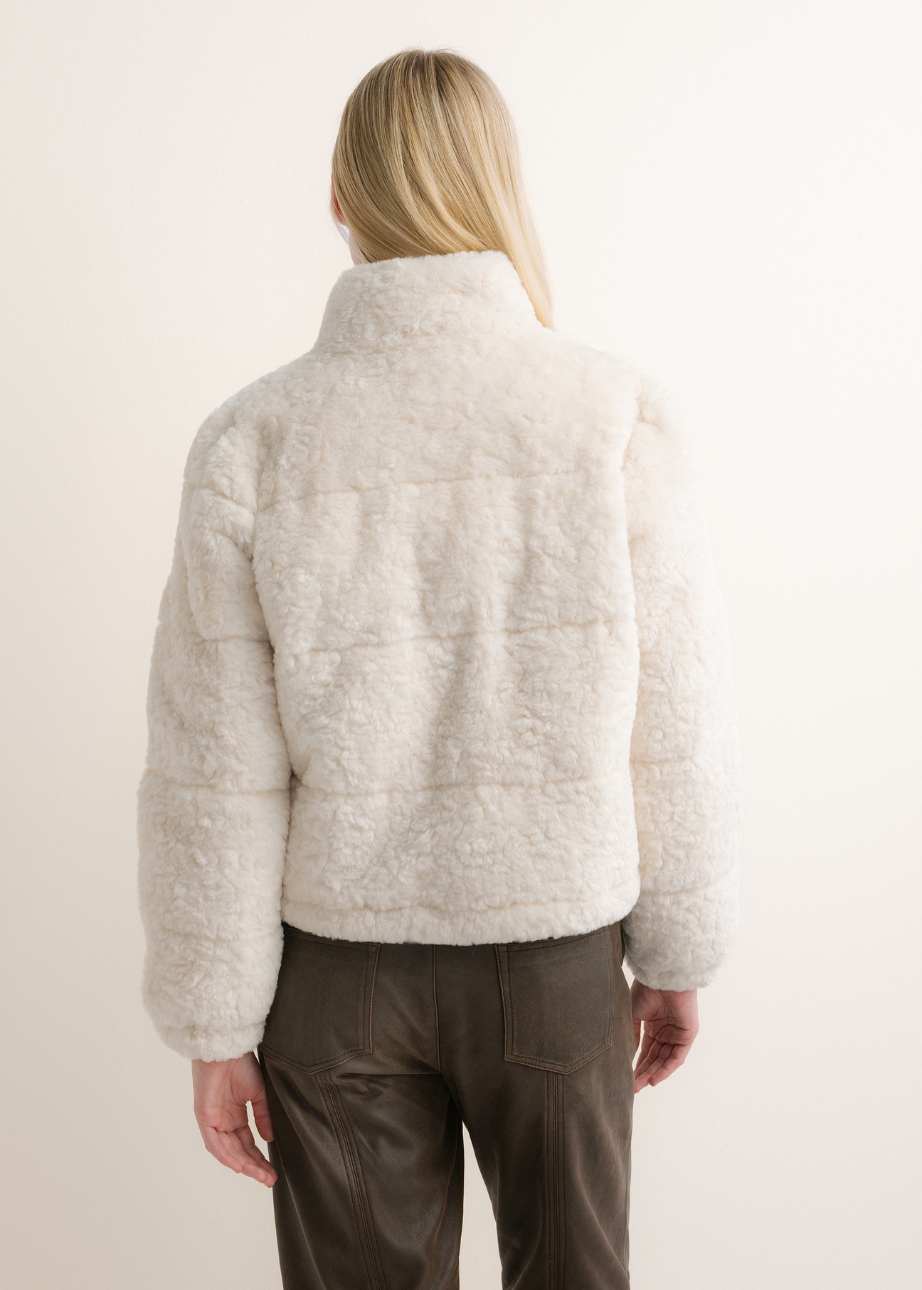 Cream-colored short women's fur coat FUTDP-0092-0B(Z26), rear view on a model. Half-body shot.