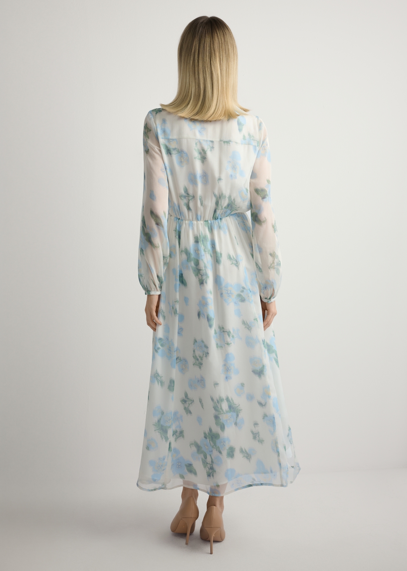 Women's cream floral dress SUKDT-0265-7P(W26), back view of the product on the model. Full body visible.