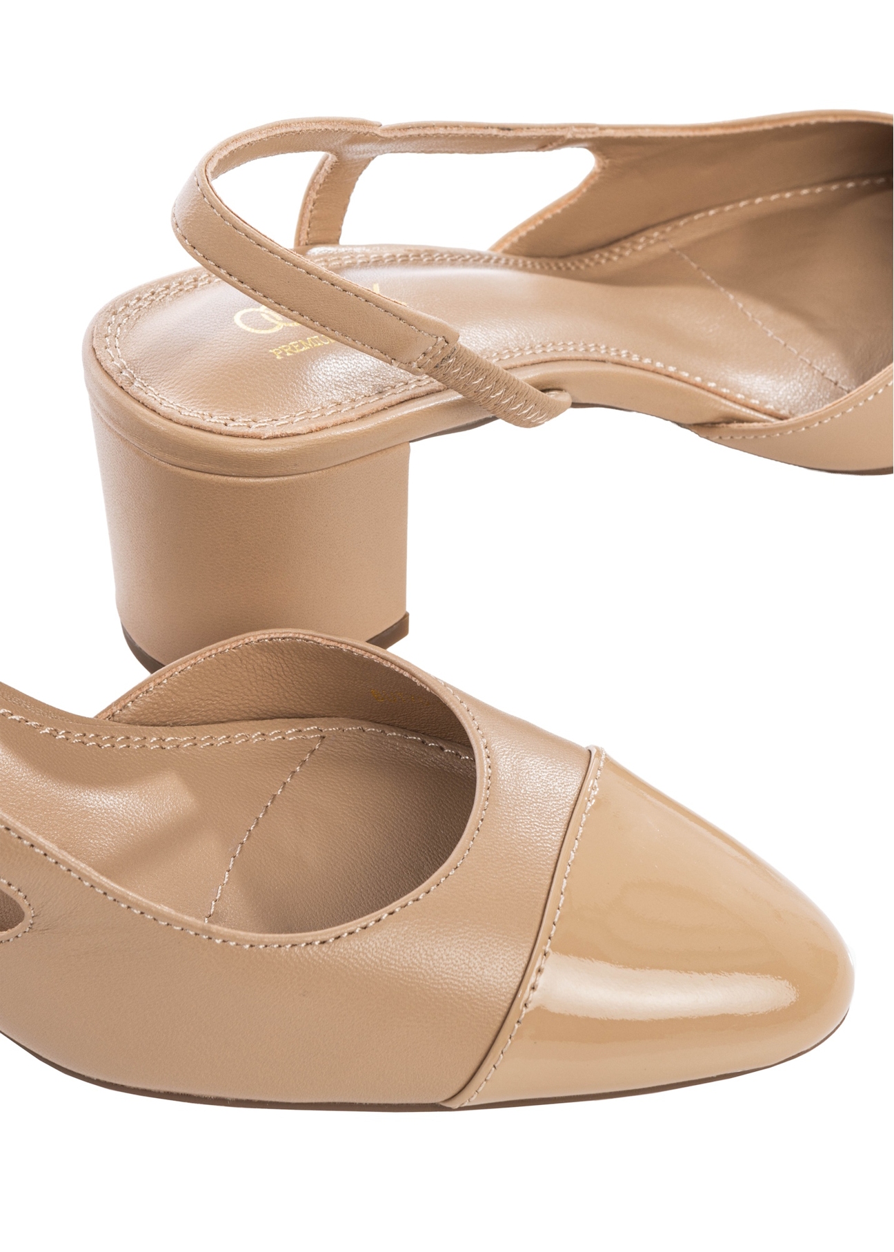 Beige leather pumps with open heel BUTYD-1173-1B(W26), close-up of the product on a white background.