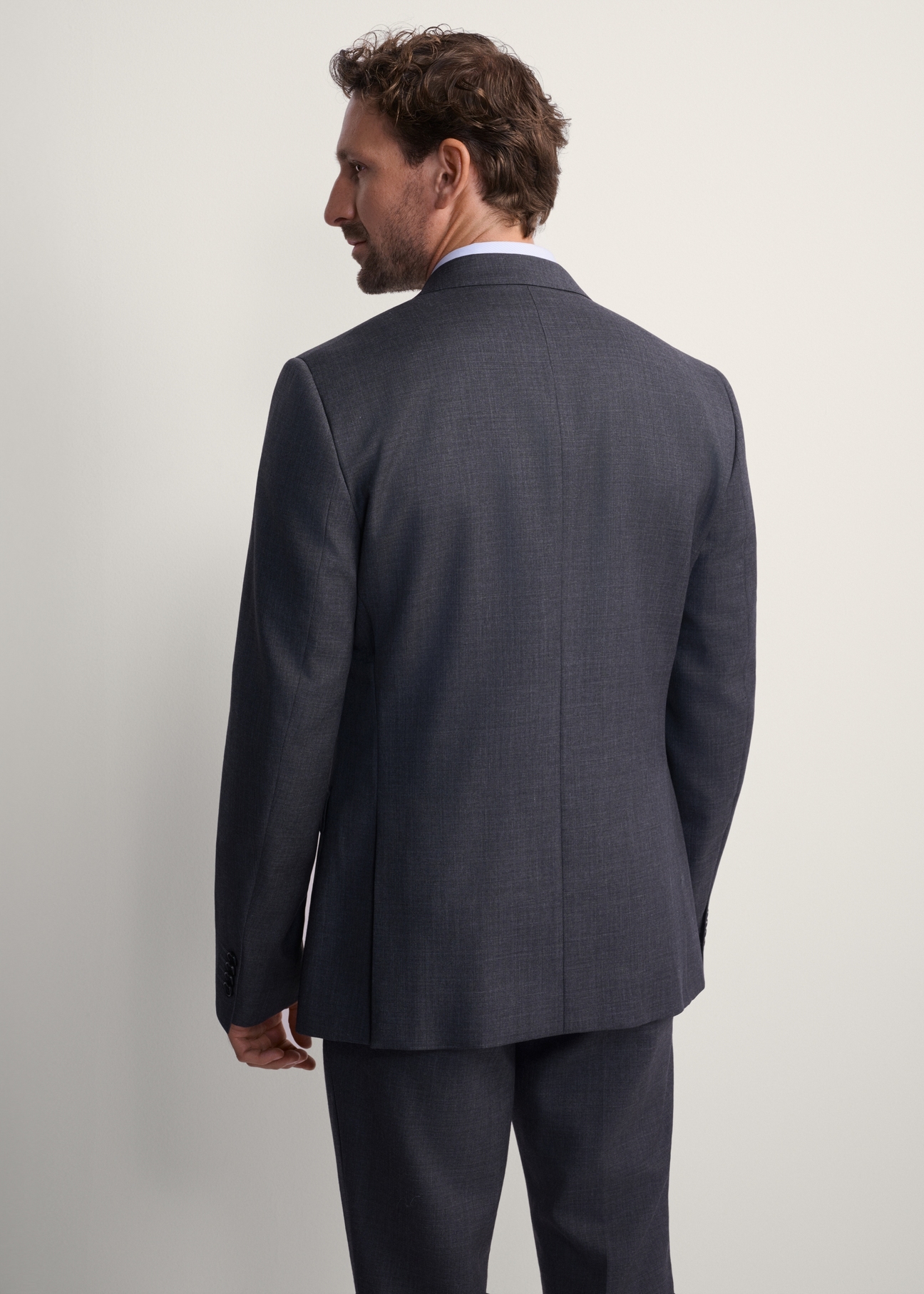 Men's graphite wool-blend jacket MARMT-0018-95(Z25), back view of the product on the model. Half of the silhouette visible.