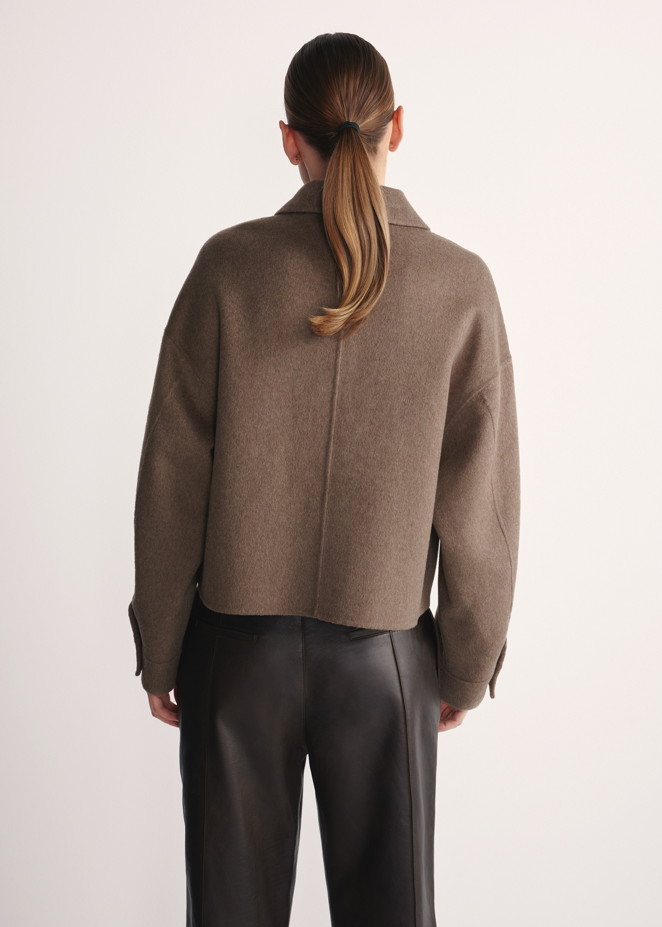 Women's short coat PLADT-0067-82(Z25), product view from the back on the model. Half of the silhouette visible.