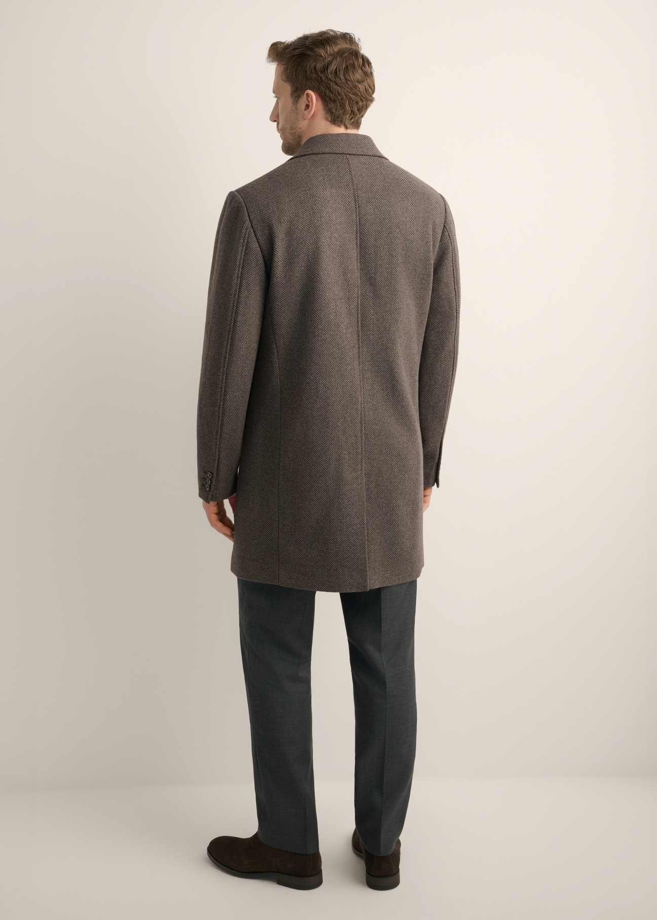 Men's wool herringbone coat PLAMT-0006-9C(Z26), product view from the back on the model. Full silhouette visible.