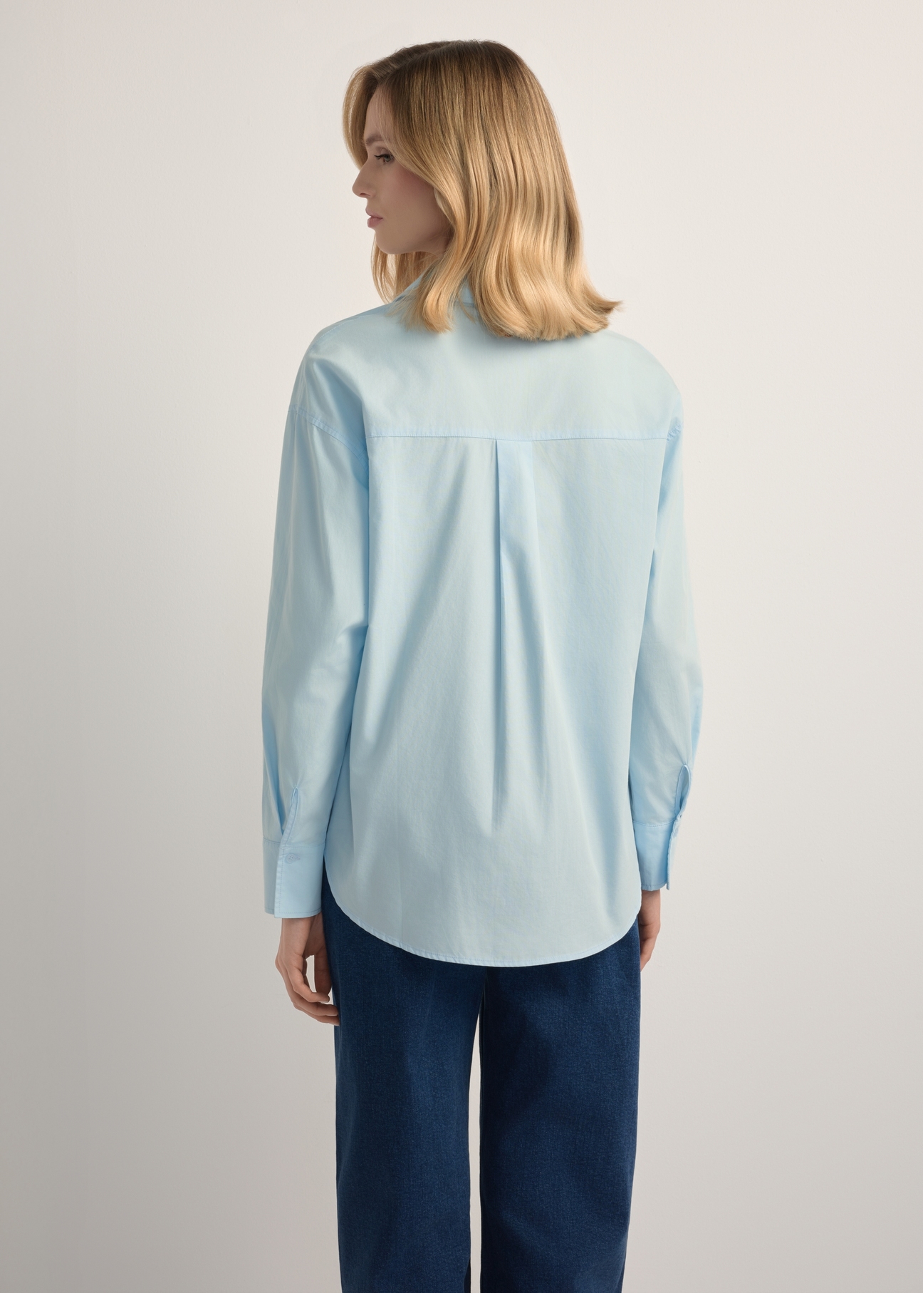 Blue cotton women's shirt KOSDT-0181-7A(W26), back view of the product on the model. Half of the silhouette visible.