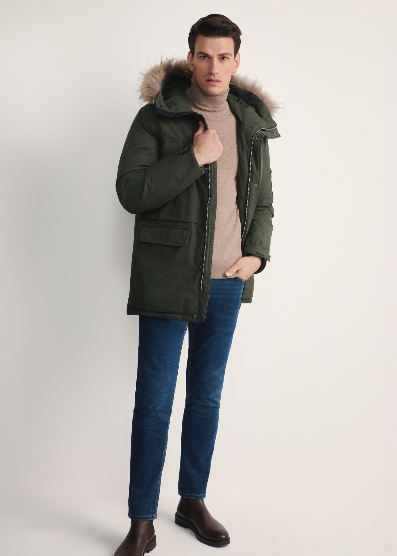 Men's winter jacket in olive green KURMT-0395-51(Z25) - front view of model against white background. Full body visible.