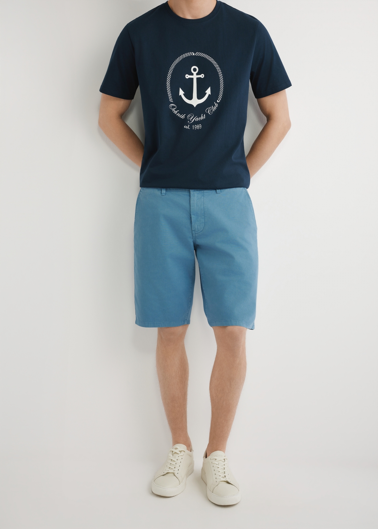 Men's blue shorts SZOMT-0029-7B(W26), front view of the product on the model. Half of the silhouette visible.