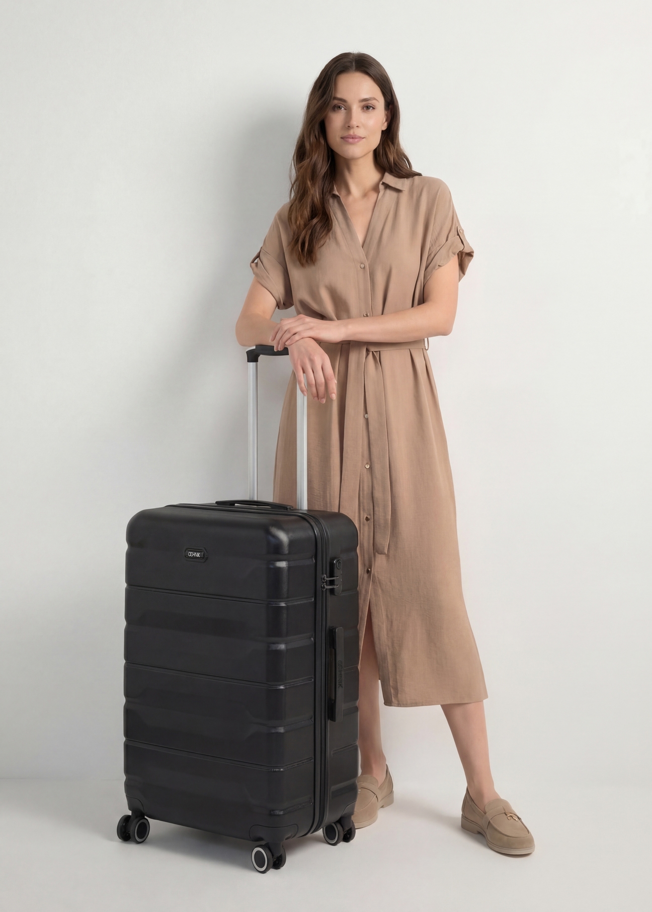 Large suitcase on wheels WALAB-0067-99-28(W25), product view diagonally next to the model, the entire model is visible.