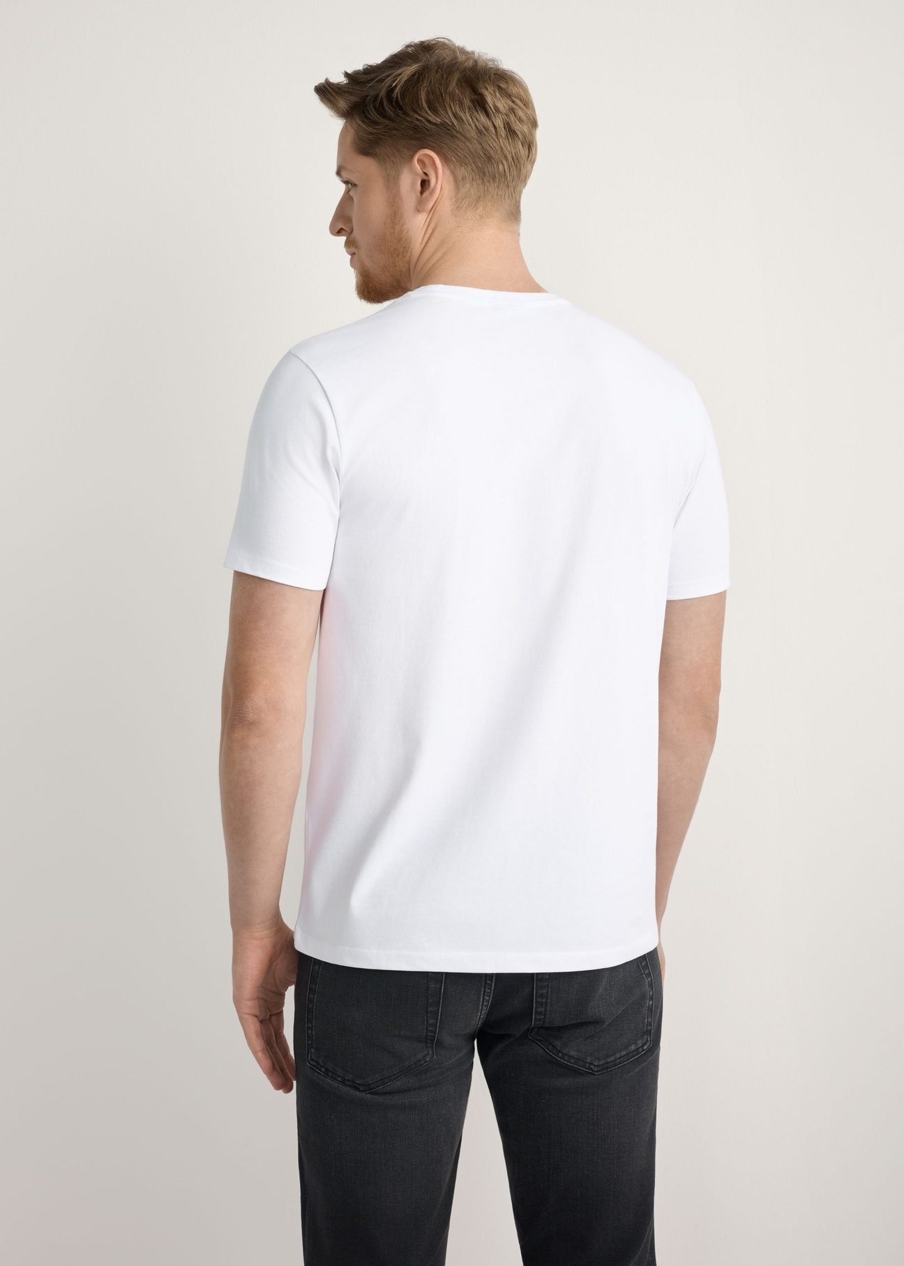 Men's white T-shirt TSHMT-0120-0A(Z26) - product view from the back on the model, half of the silhouette visible.