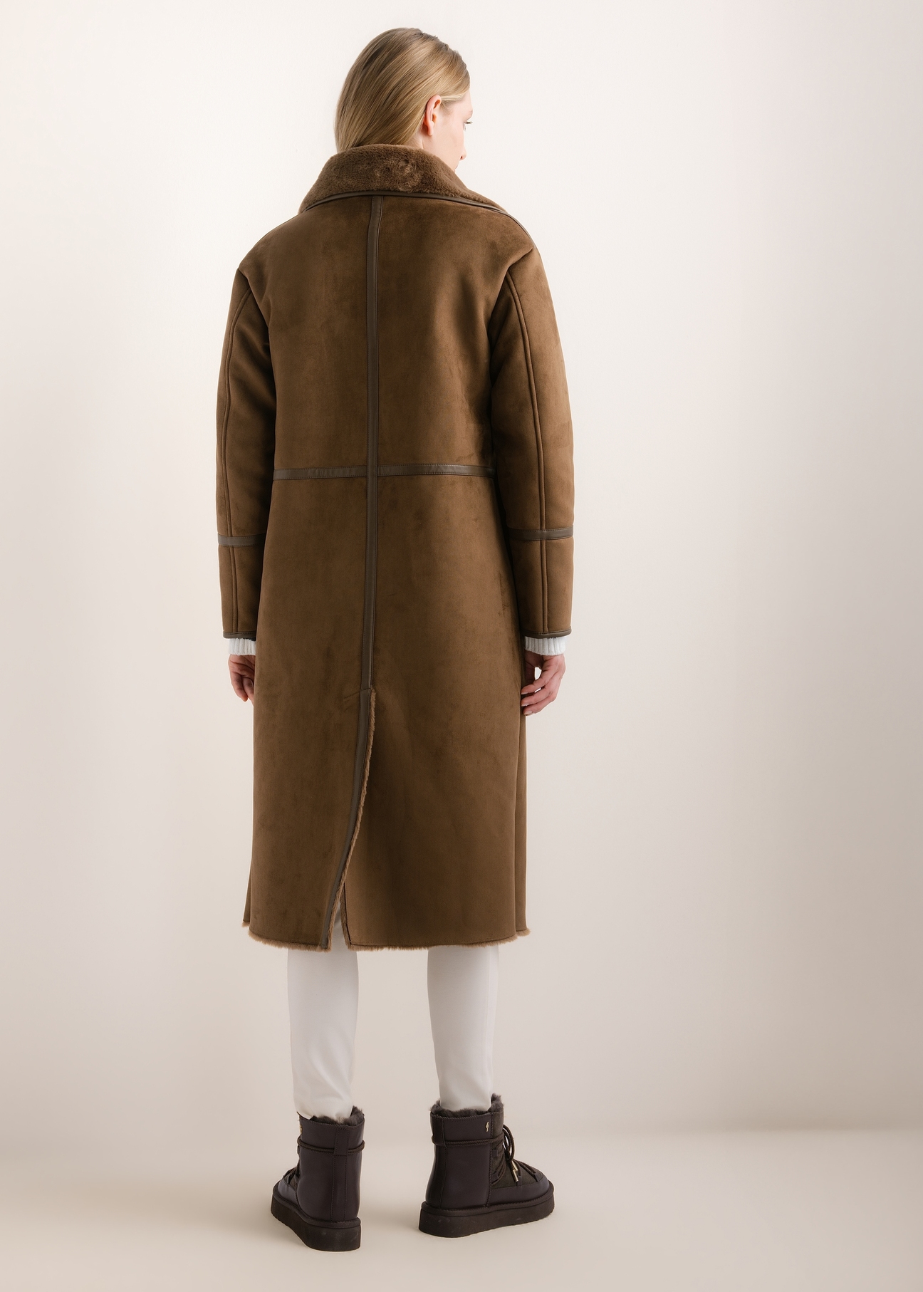Long brown women's shearling coat KOZDP-0019-1H(Z26), rear view on a model. Full-body shot.