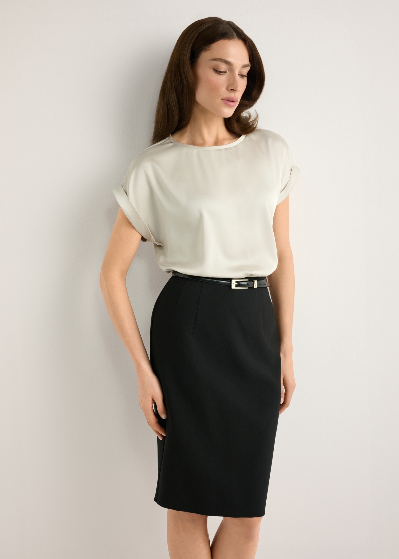 Light beige women's blouse BLUDT-0205-1A(W26), front view of the product on the model. Half of the silhouette visible.