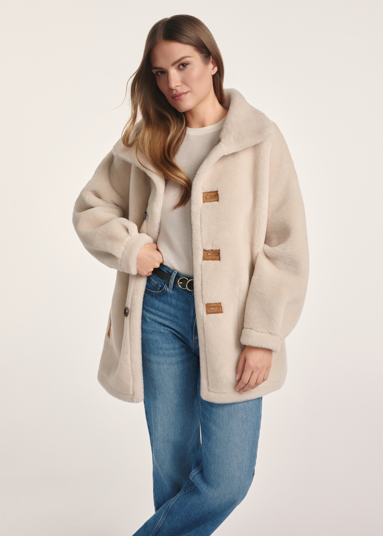 Women's double-sided sheepskin coat KOZDP-0009-24(Z24), product view from the front on the model, half of the silhouette visible.